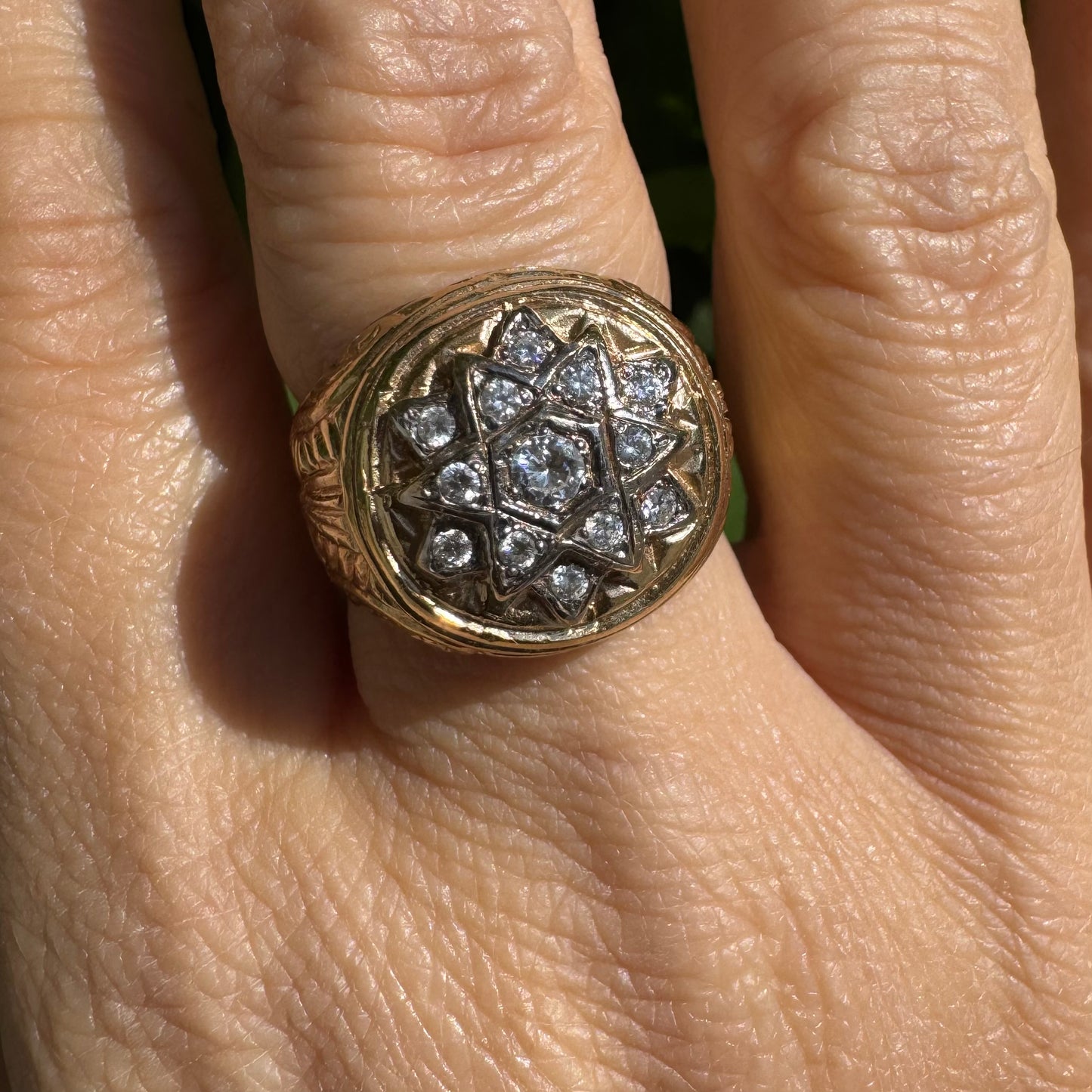 18K gold ring set with a dazzling double Star of David motif, meticulously set with shimmering Diamonds