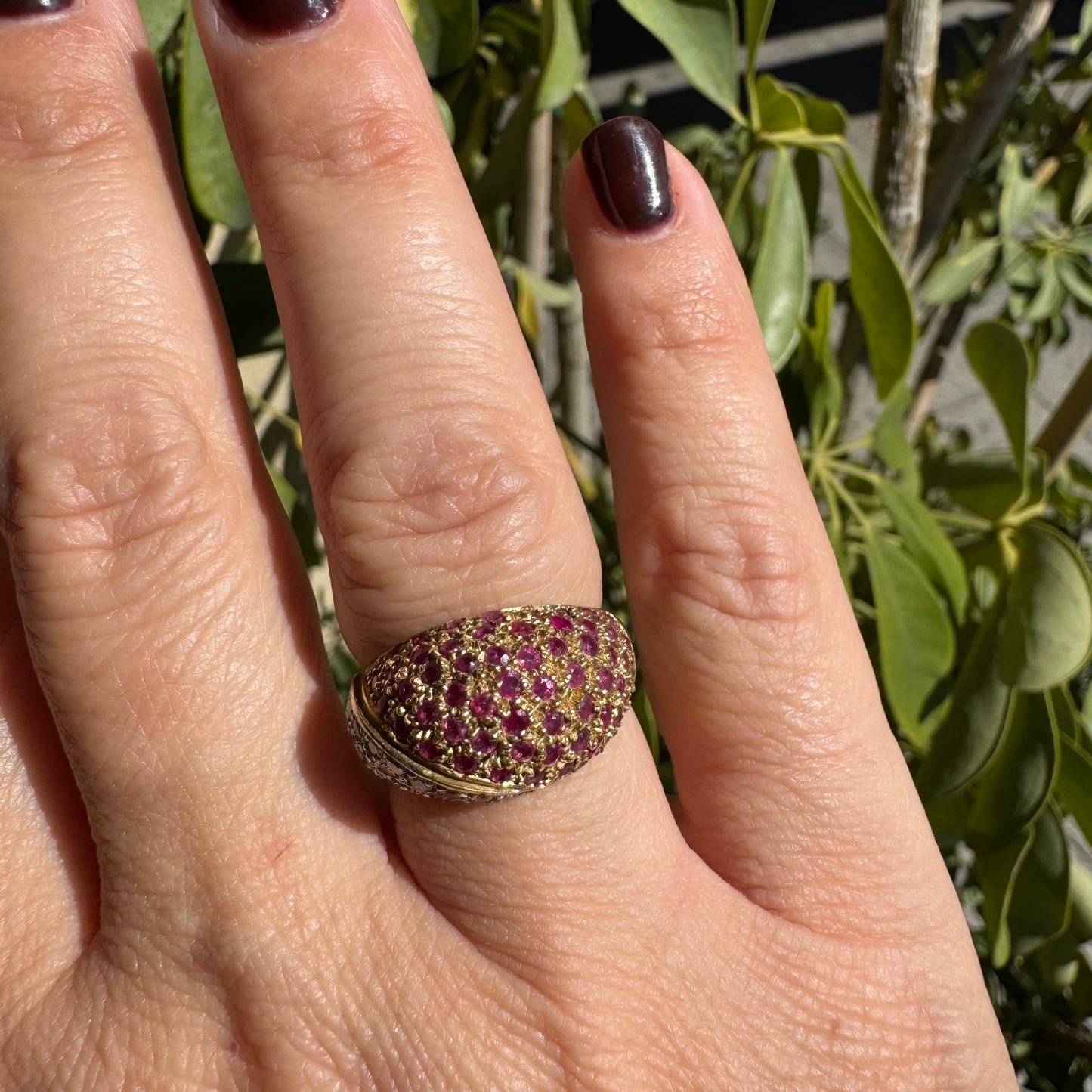 14K gold dome ring pavé-set with Diamonds and vivid Rubies in a striking two-tone design