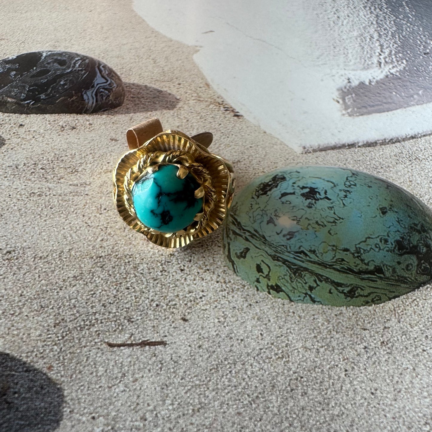 18K gold ring set with a unique Turquoise