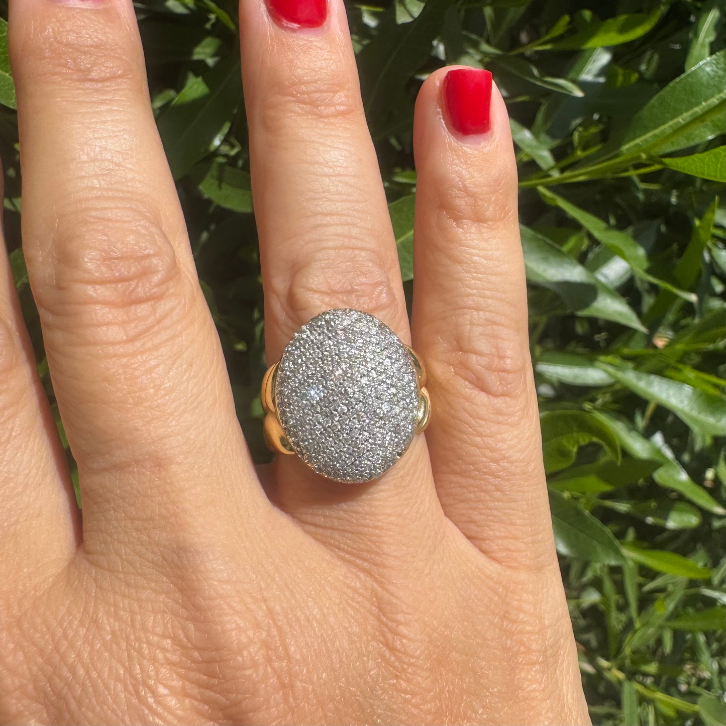 18K gold ring set with a dazzling dome of pavé-set diamonds