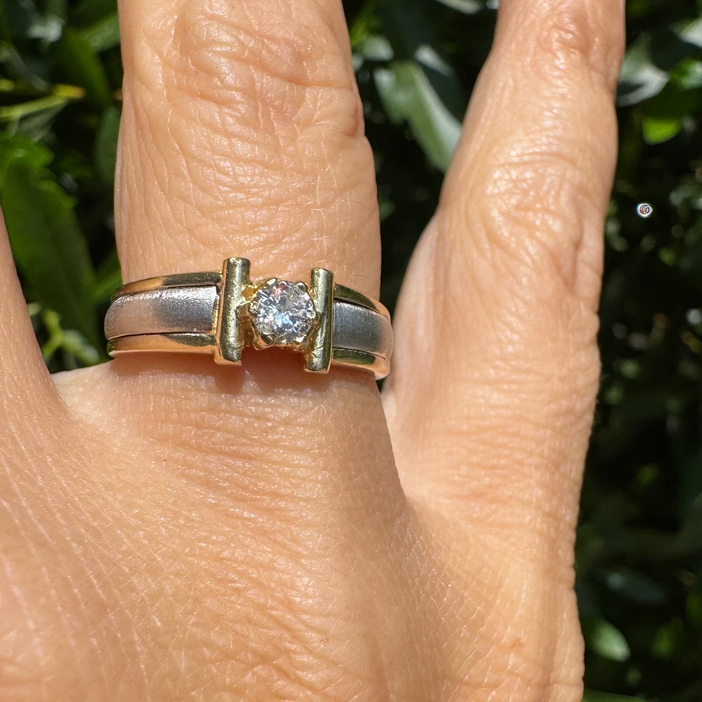 14K two-tone gold ring set with one center Diamond