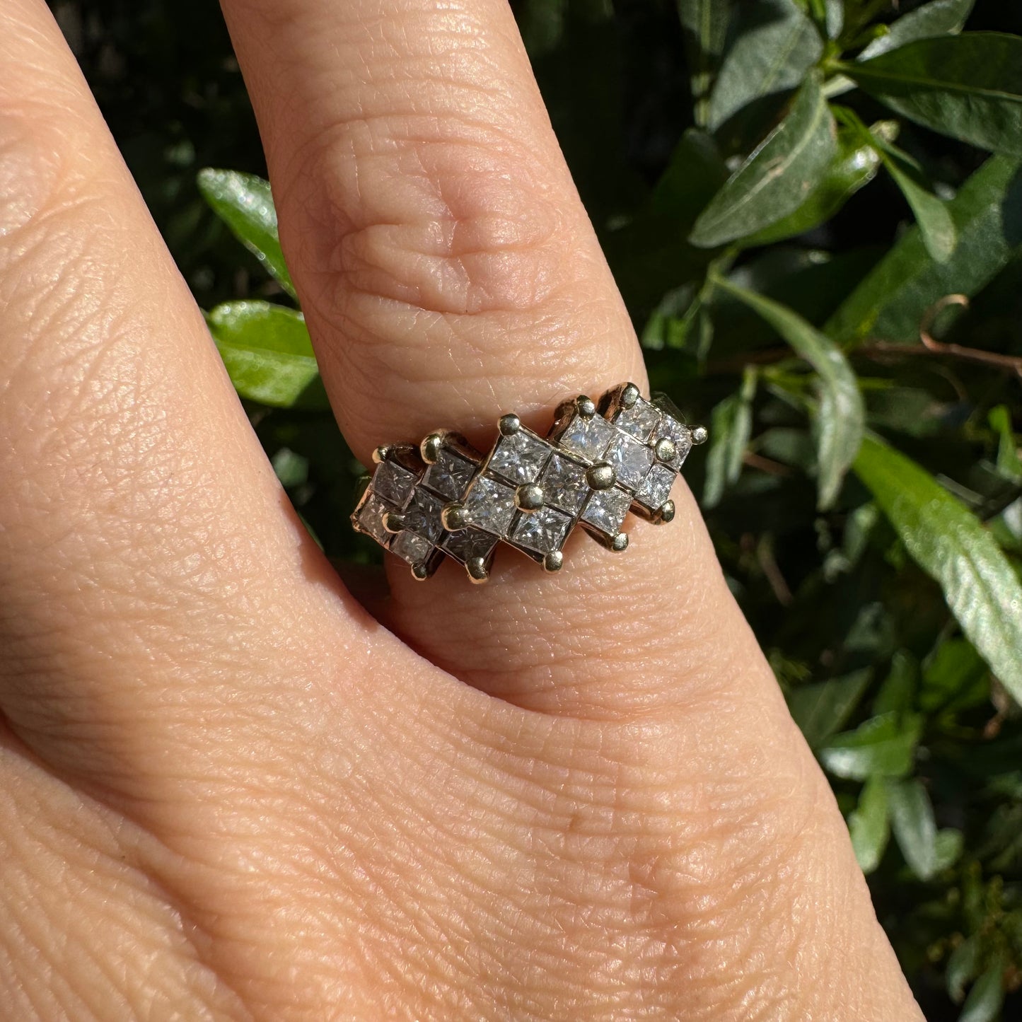 14K gold ring set with Diamonds in a criss-cross design