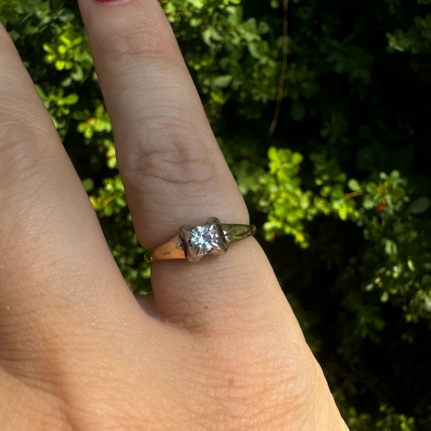 14K gold ring set with one center Diamond