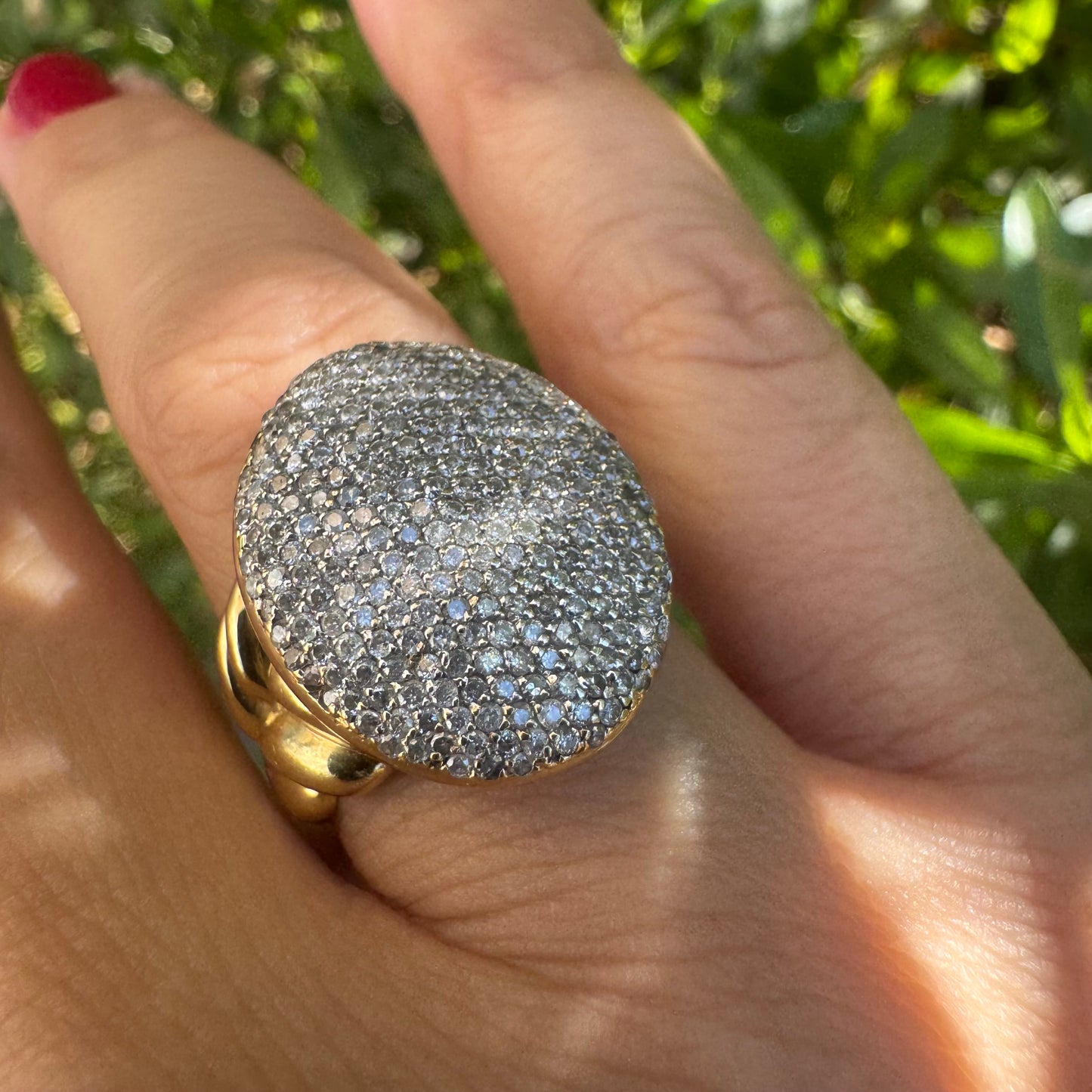 18K gold ring set with a dazzling dome of pavé-set diamonds