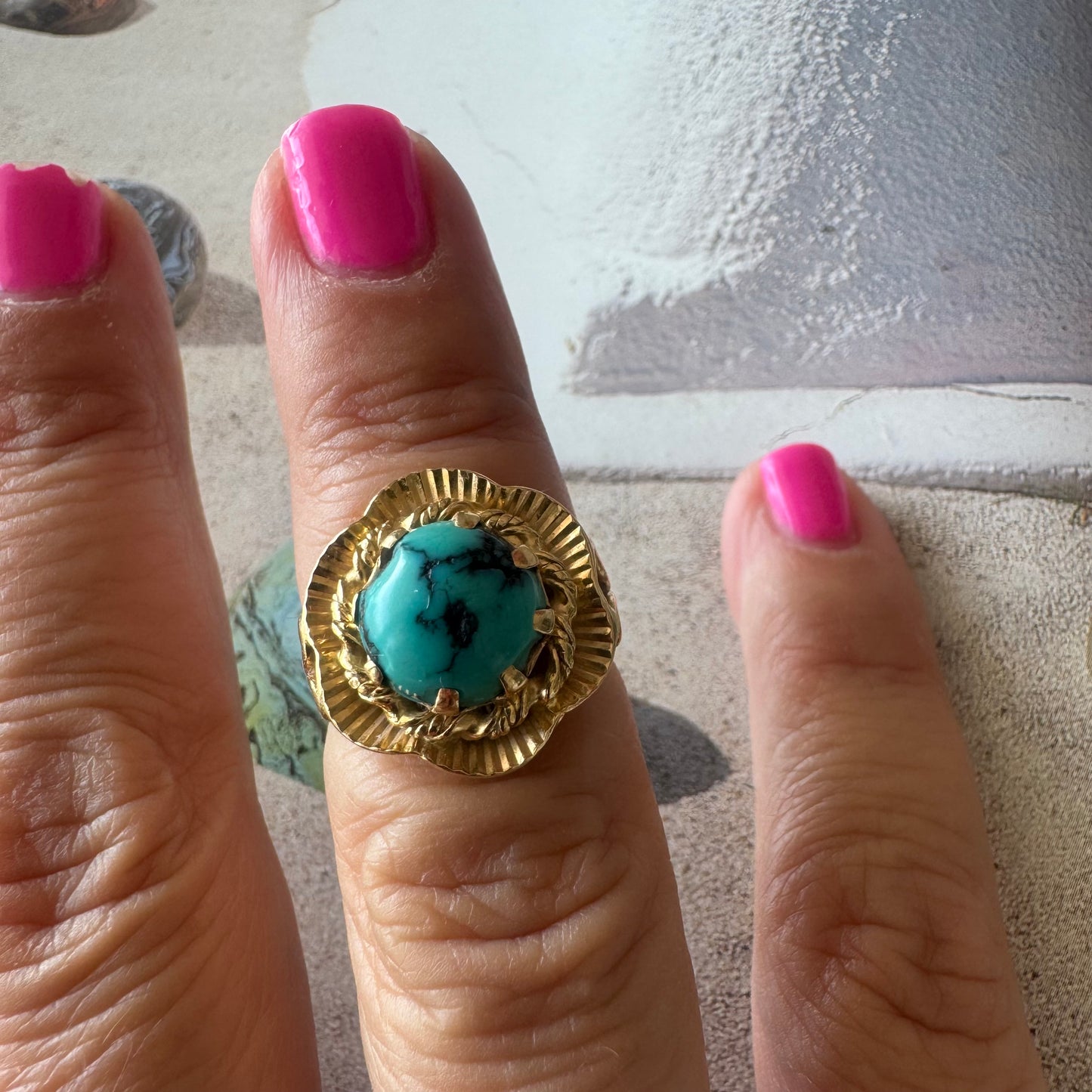 18K gold ring set with a unique Turquoise