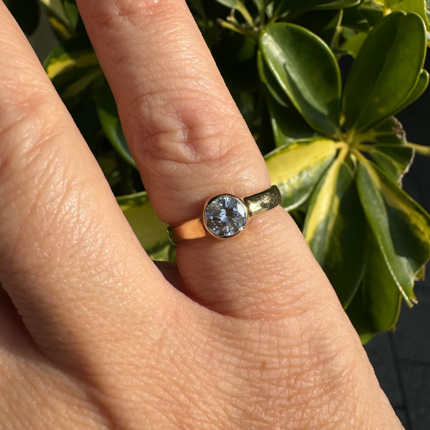 14K gold ring set with one center Diamond