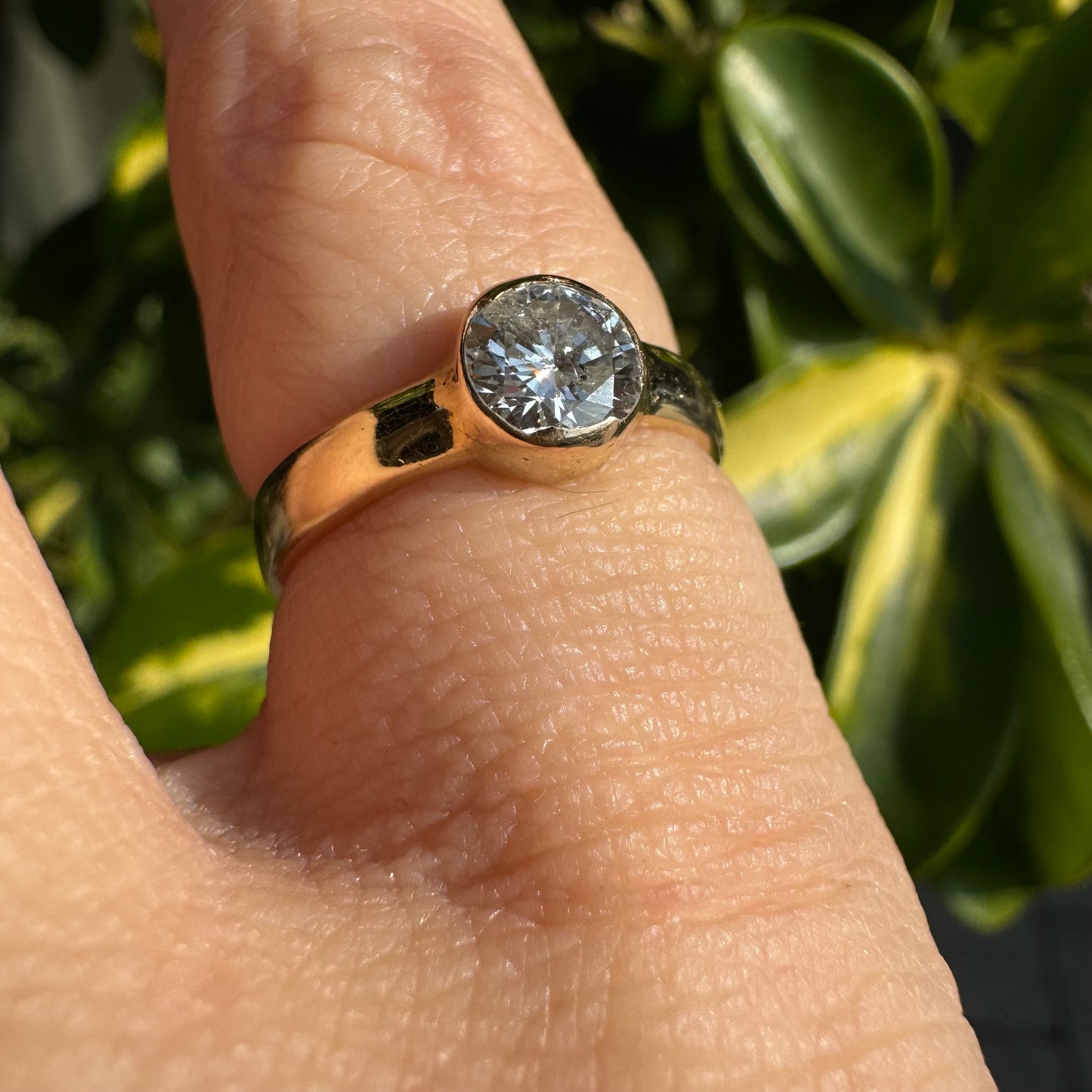 14K gold ring set with one center Diamond
