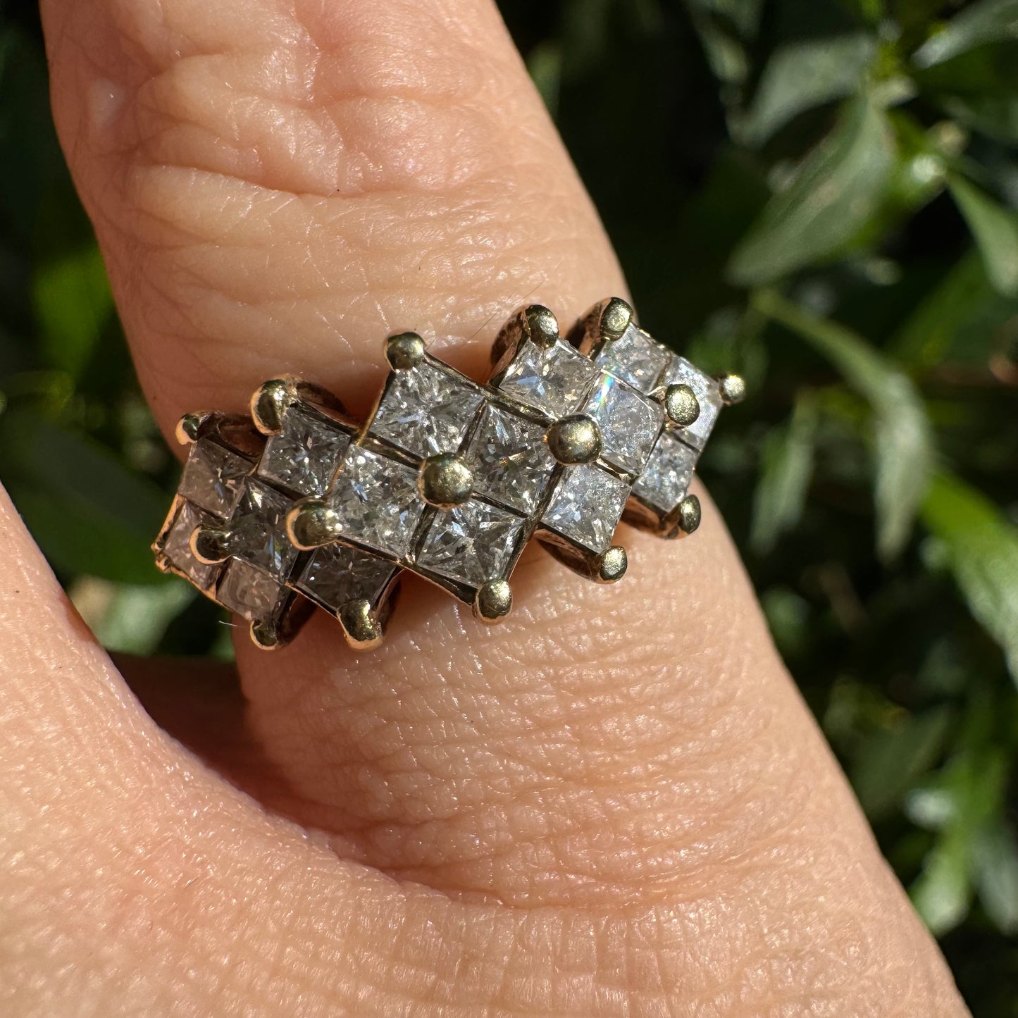 14K gold ring set with Diamonds in a criss-cross design