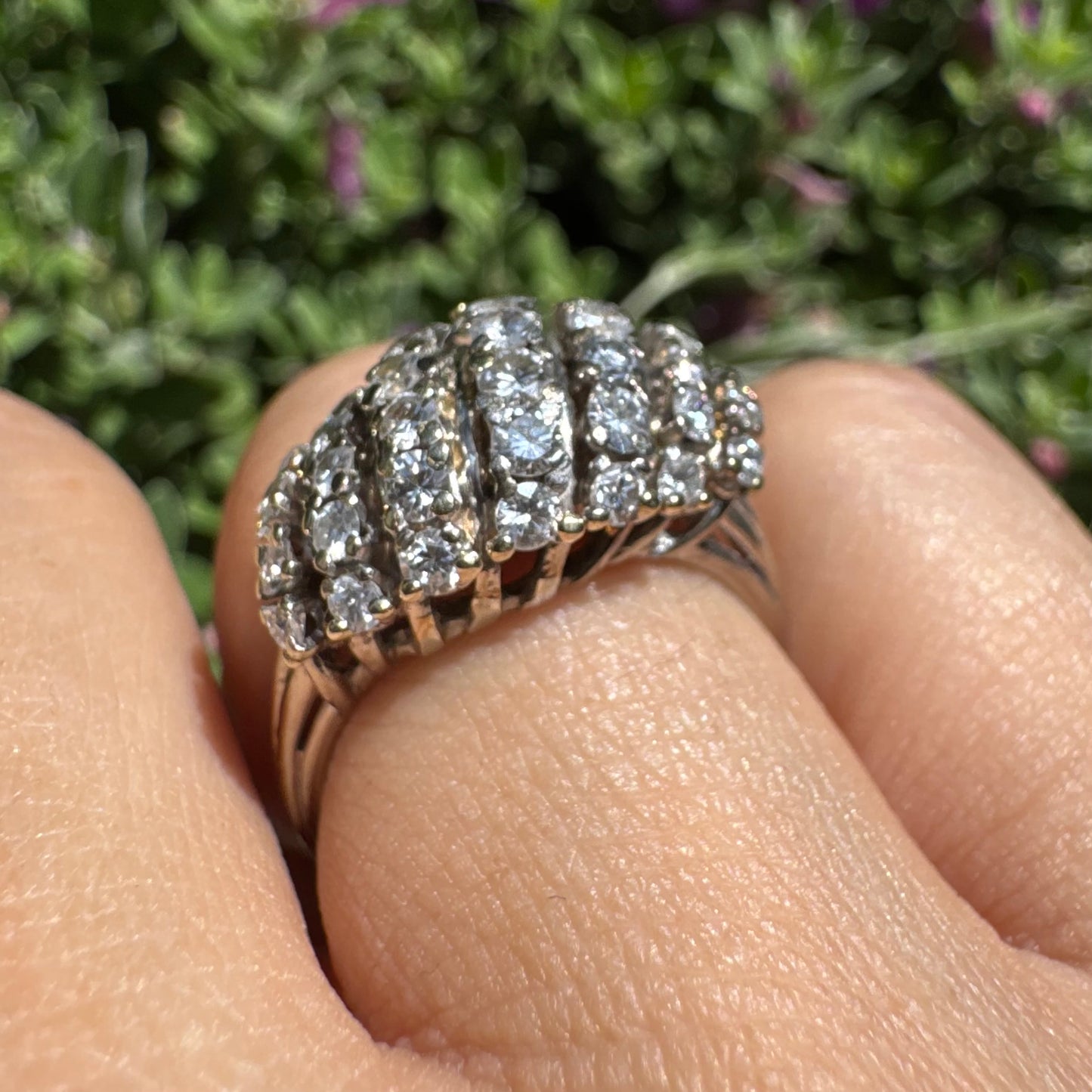 18K gold ring set with rows of sparkling Diamonds in a bold, sculptural design
