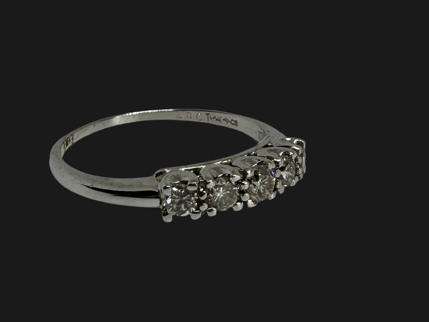 14K gold ring set with Diamonds