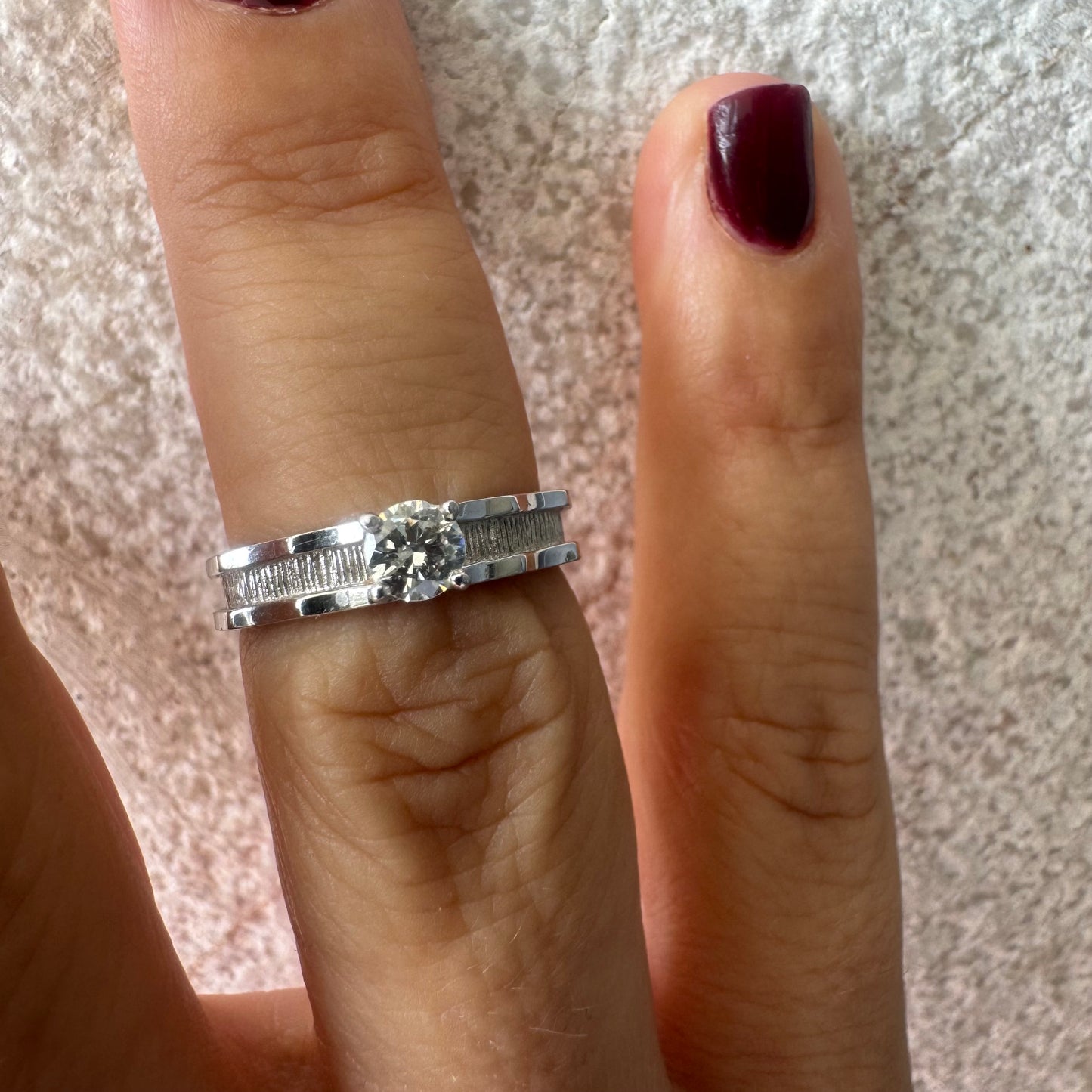 14K gold ring set with one center Diamond