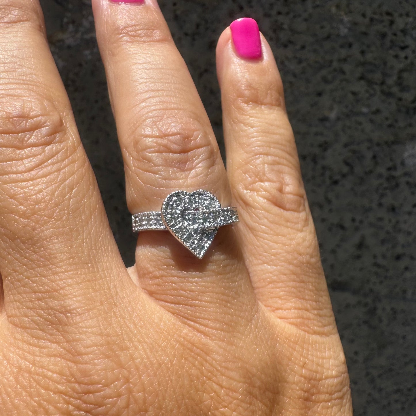 14K gold heart-shaped ring encrusted with shimmering Diamonds