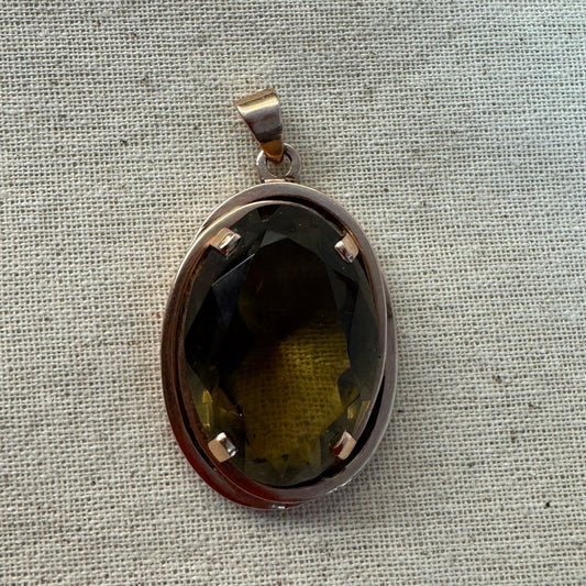 14K gold pendant set with a large oval-cut Smoky Quartz in a rare olive-green hue