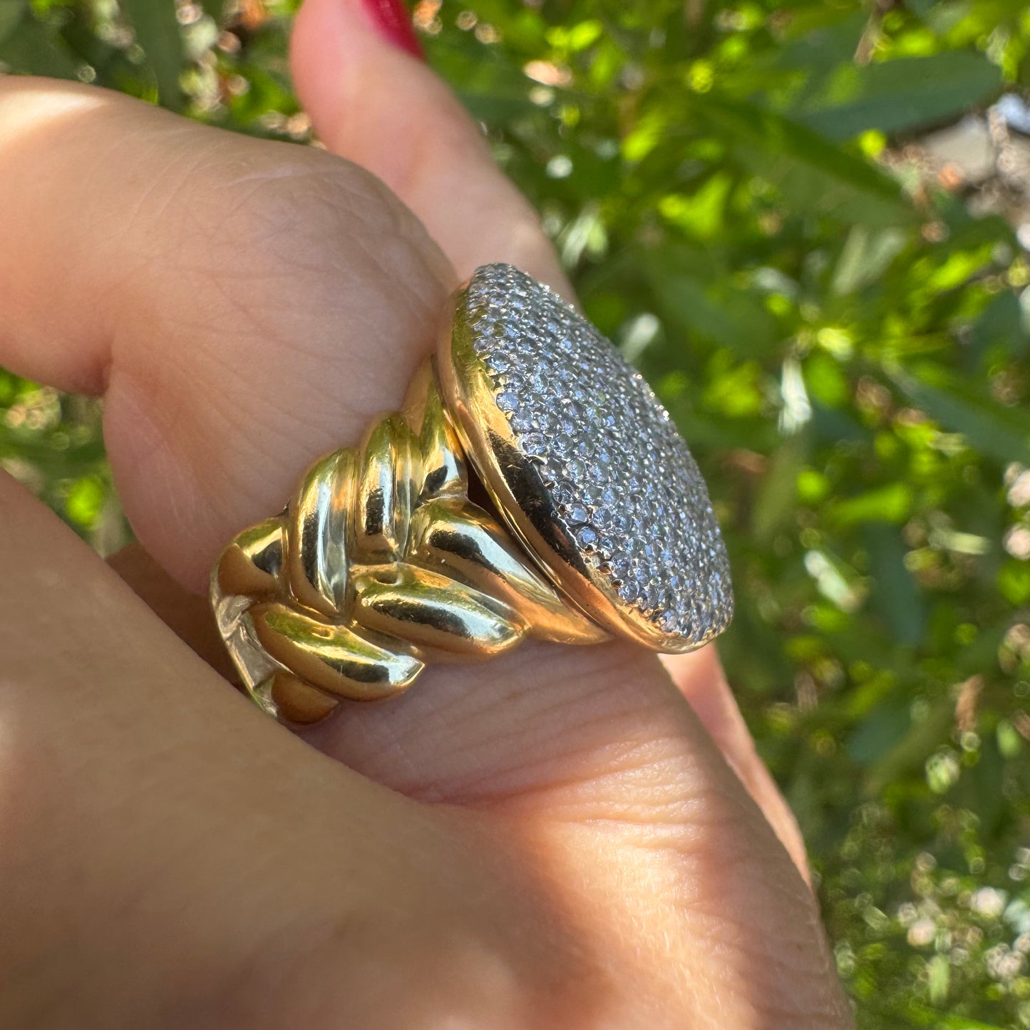 18K gold ring set with a dazzling dome of pavé-set diamonds