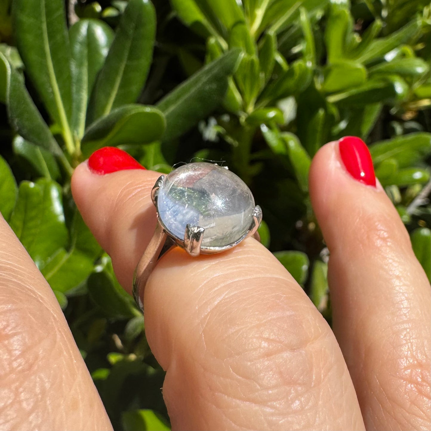 Palladium ring set with a large clear Rock Crystal cabochon.