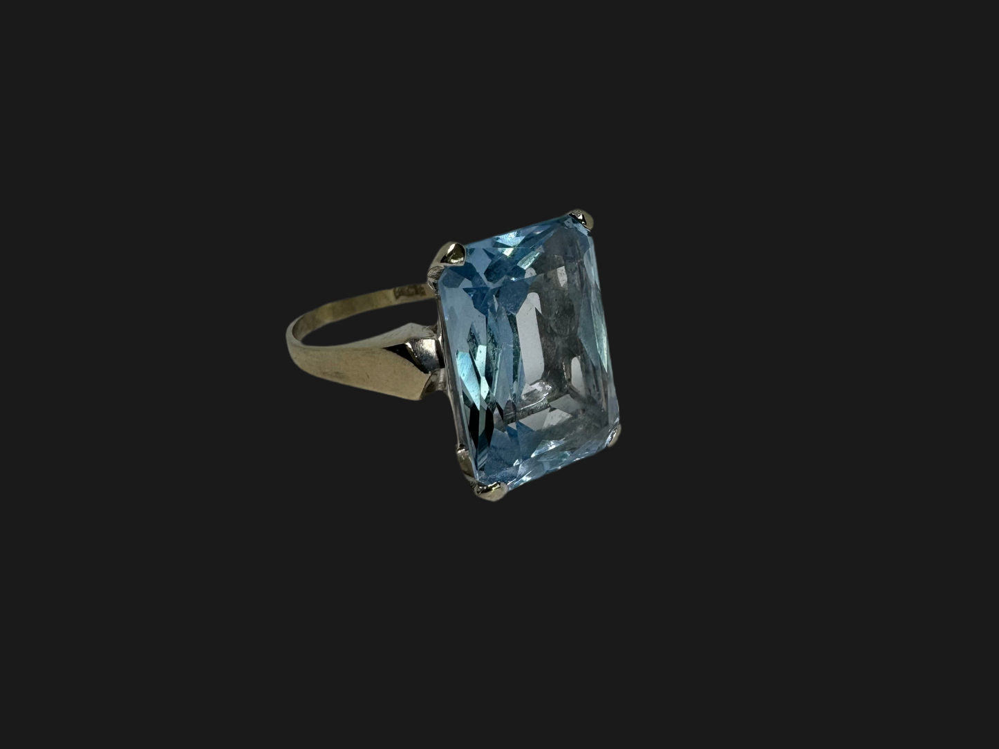14K gold ring set with Blue Topaz