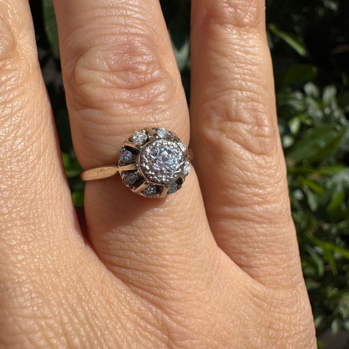 18K gold ring set with Diamonds in     a classic cluster-style