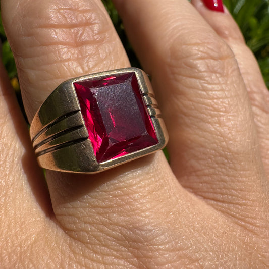 10K gold ring set with a bold red rectangular gemstone
