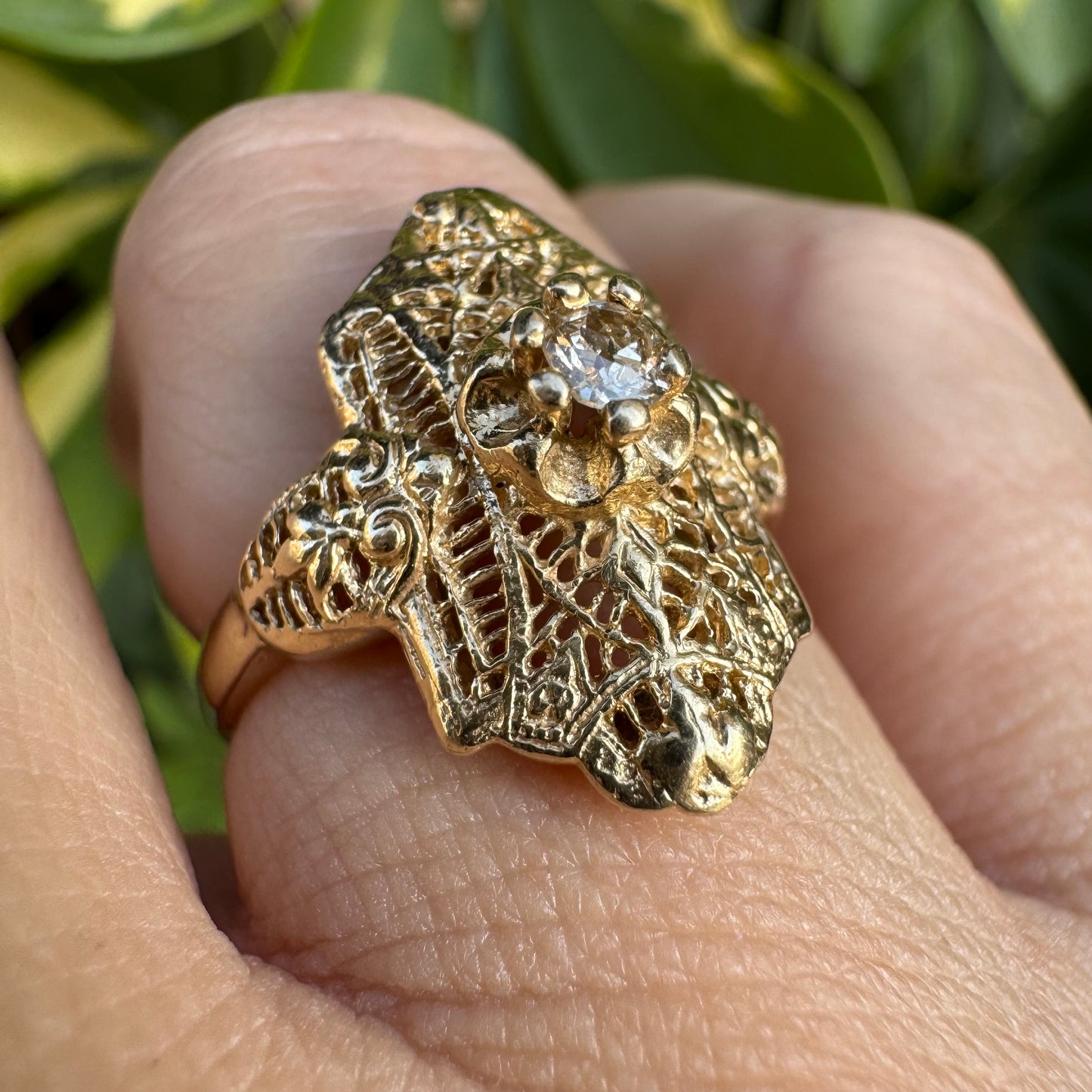 14K gold filigree ring set with an old-cut Diamond