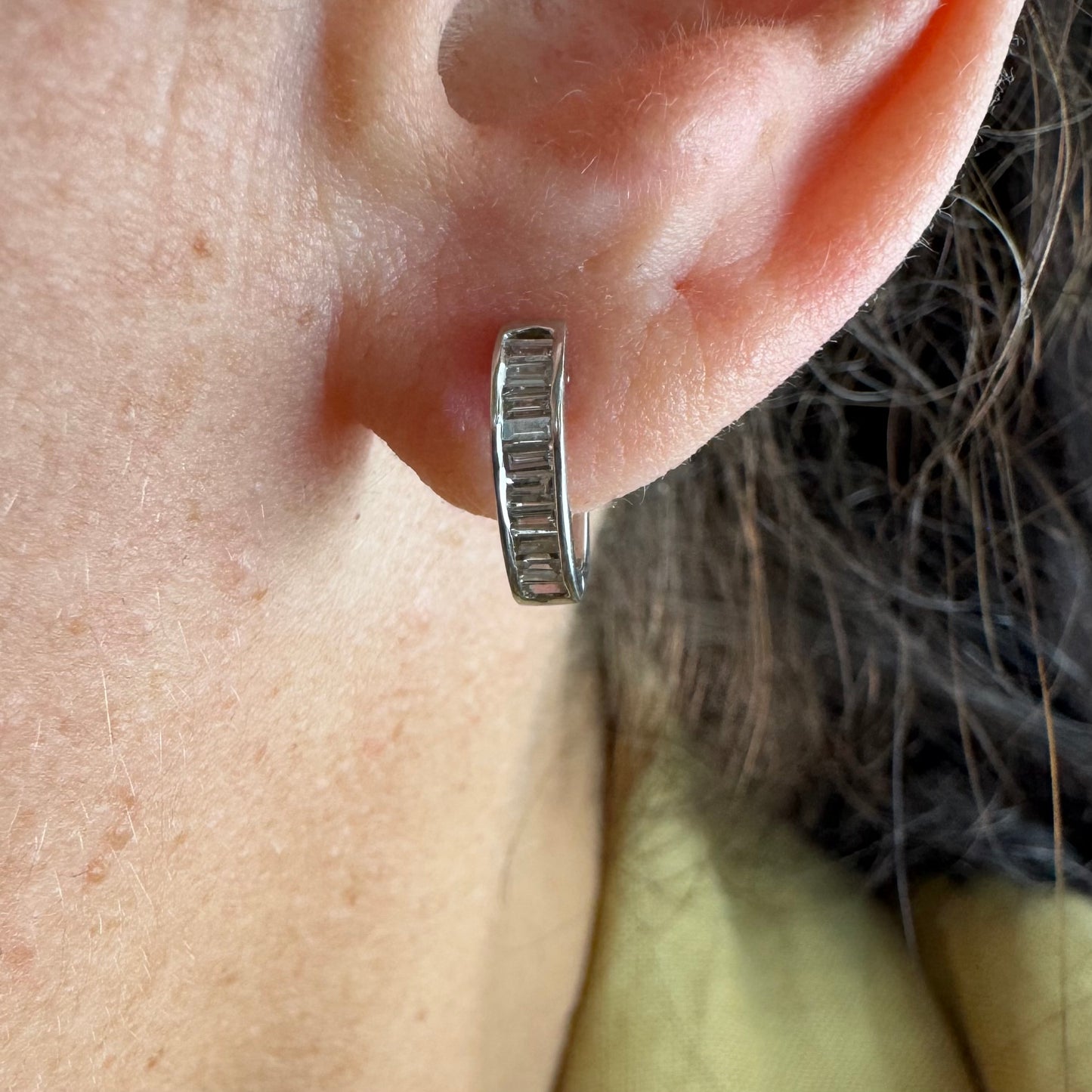 14K gold hoop earring set with a line of baguette-cut Diamonds