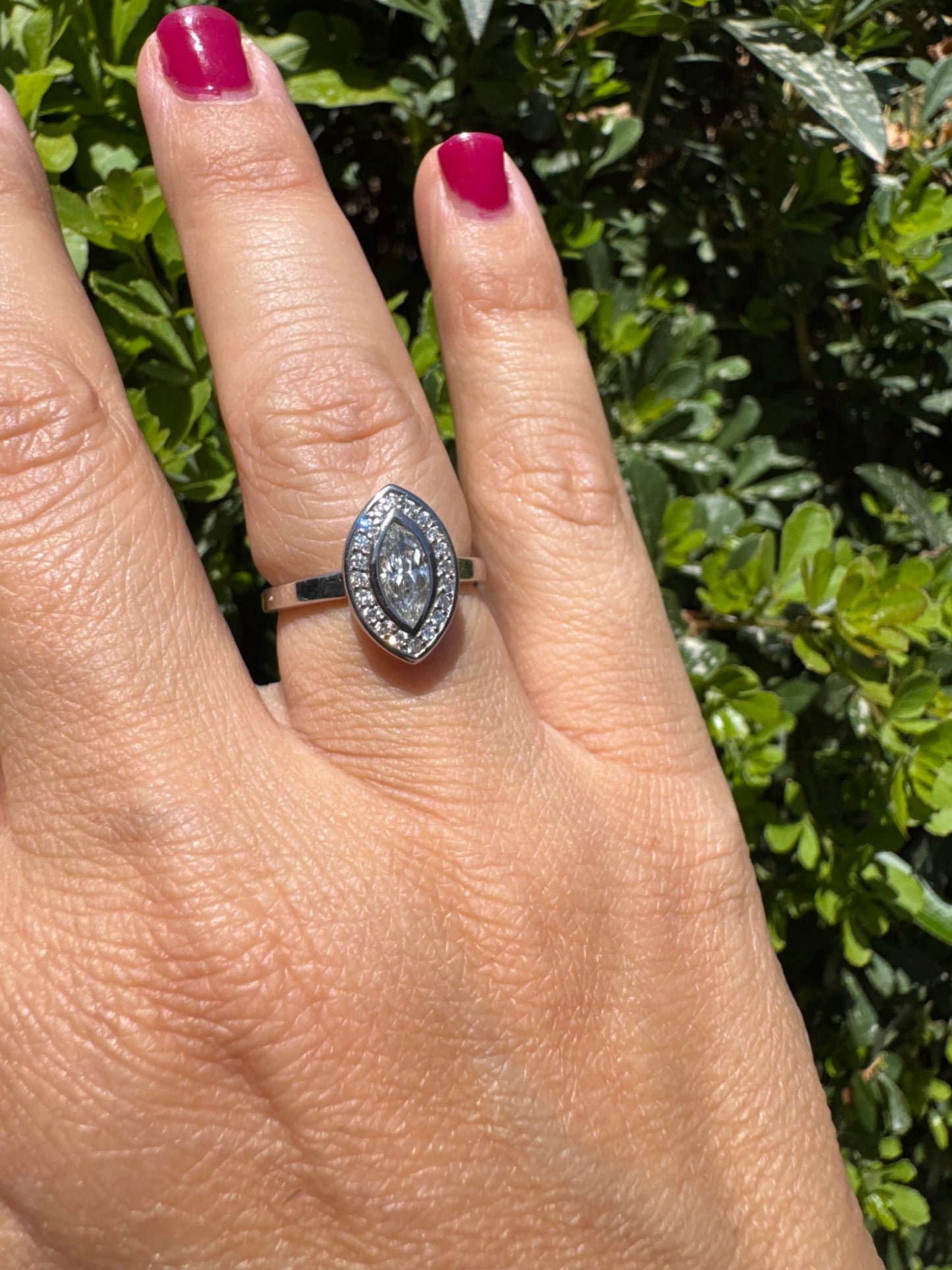 18K gold convertible ring set with two marquise-cut diamond halos that magnetically connect into a bold statement piece