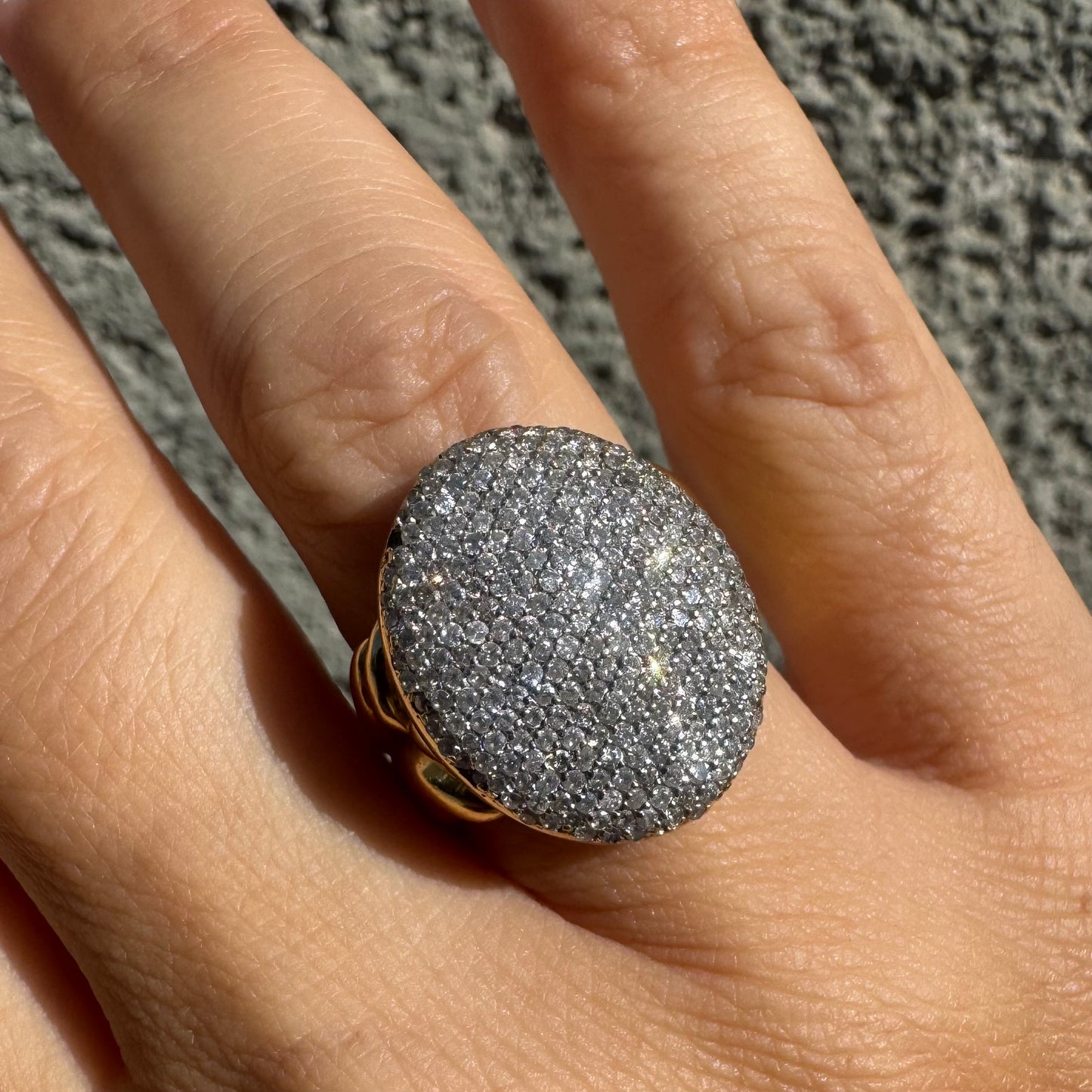 18K gold ring set with a dazzling dome of pavé-set diamonds