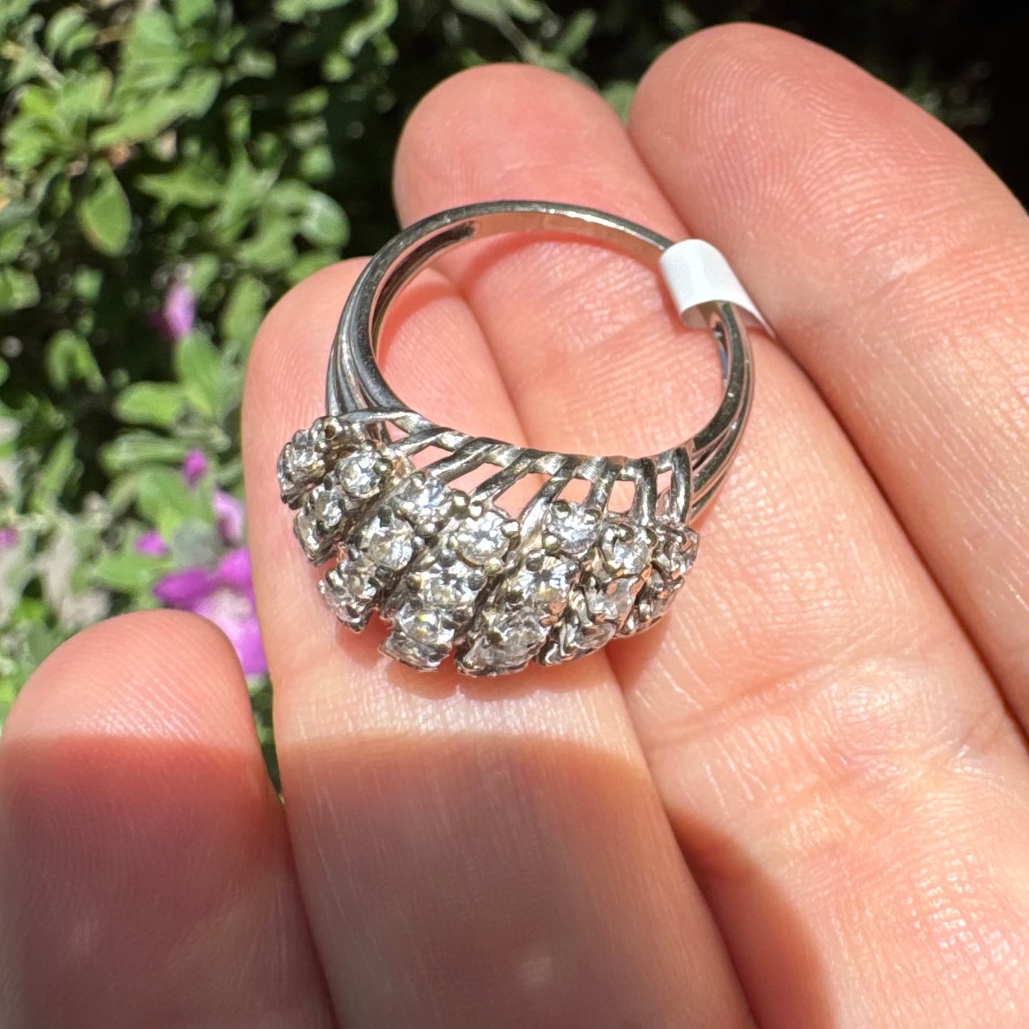 18K gold ring set with rows of sparkling Diamonds in a bold, sculptural design