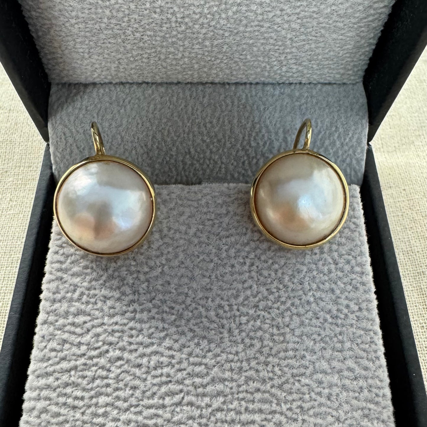 14K gold drop earrings set with flat coin pearls