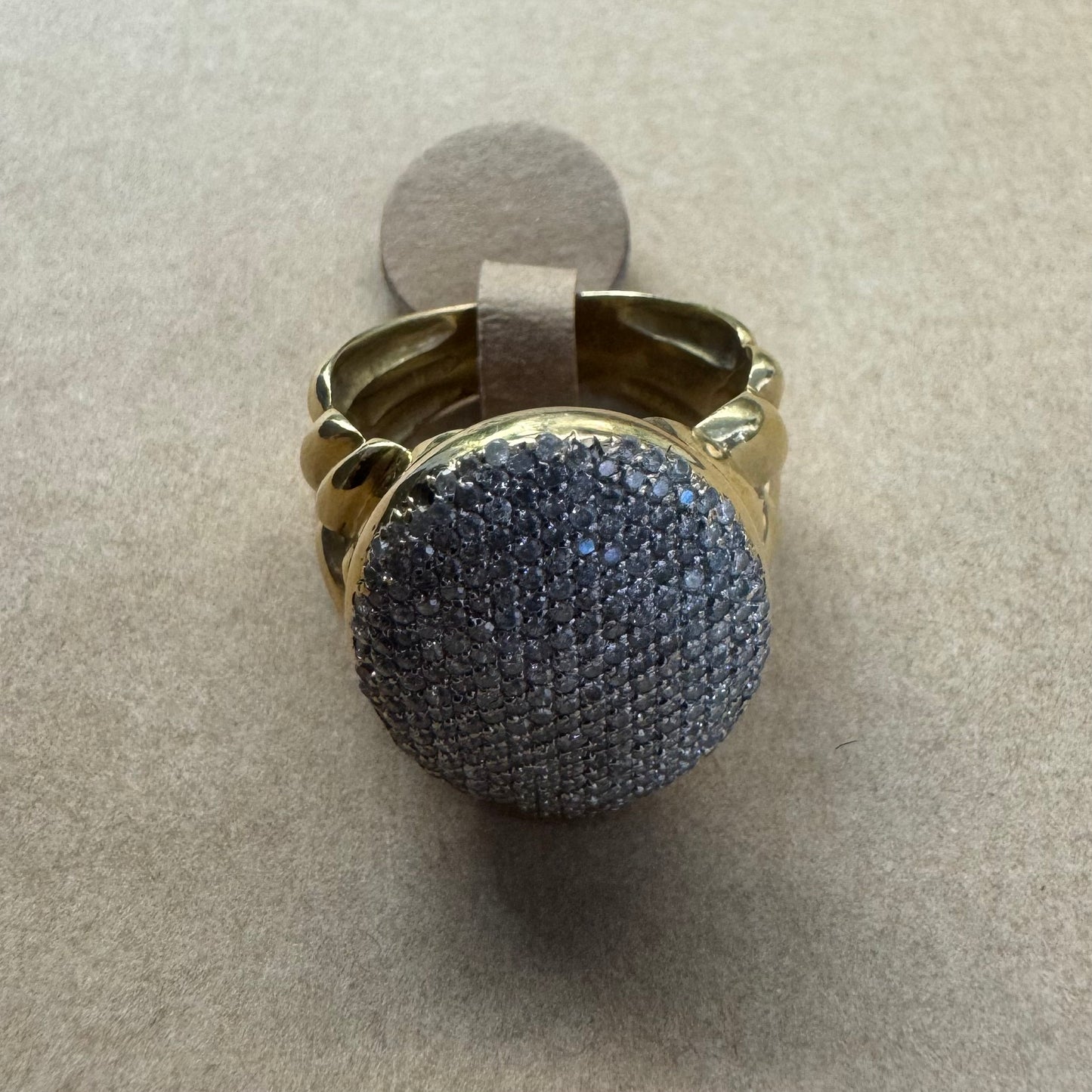 18K gold ring set with a dazzling dome of pavé-set diamonds