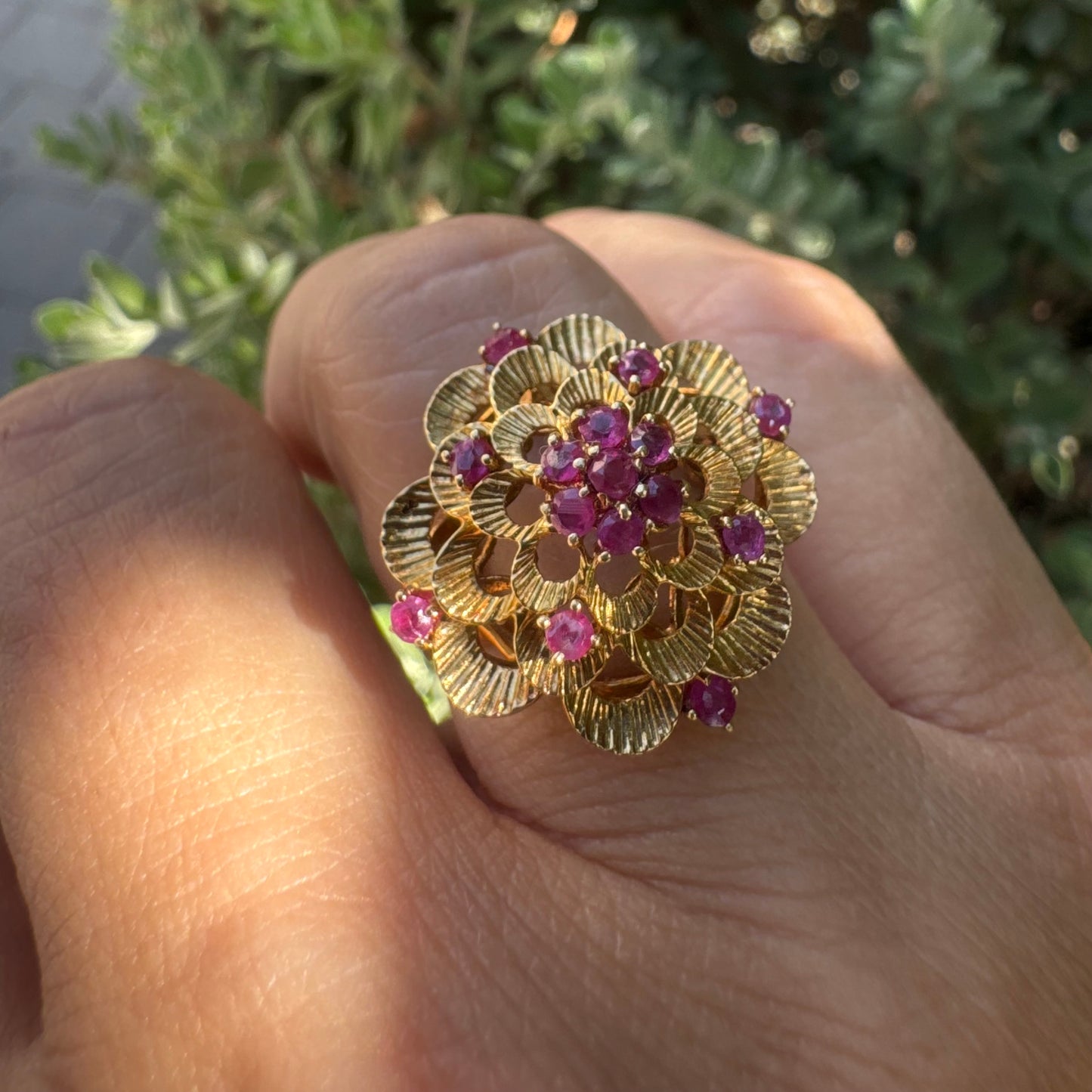 18K gold ring crafted in yellow gold, designed in a layered floral motif set with Rubies
