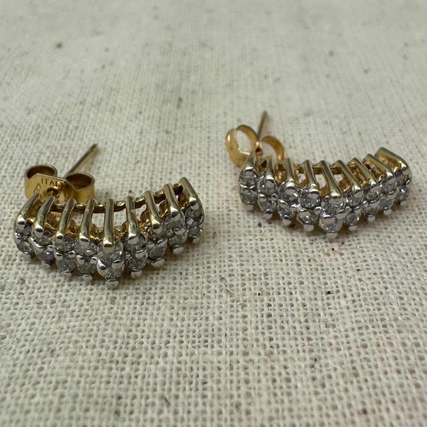 14K gold half-hoop earrings set with sparkling Diamonds in a dense pavé setting