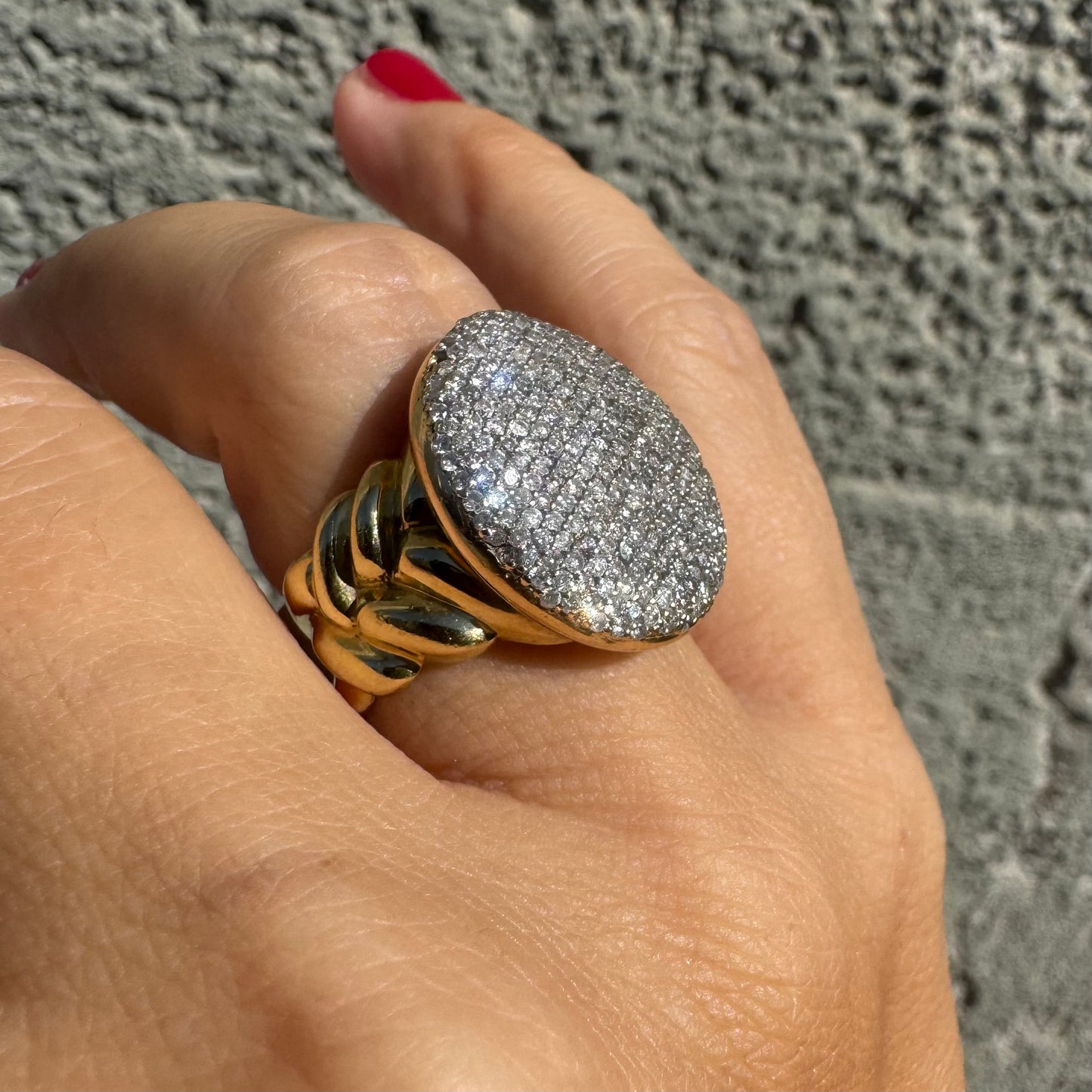 18K gold ring set with a dazzling dome of pavé-set diamonds