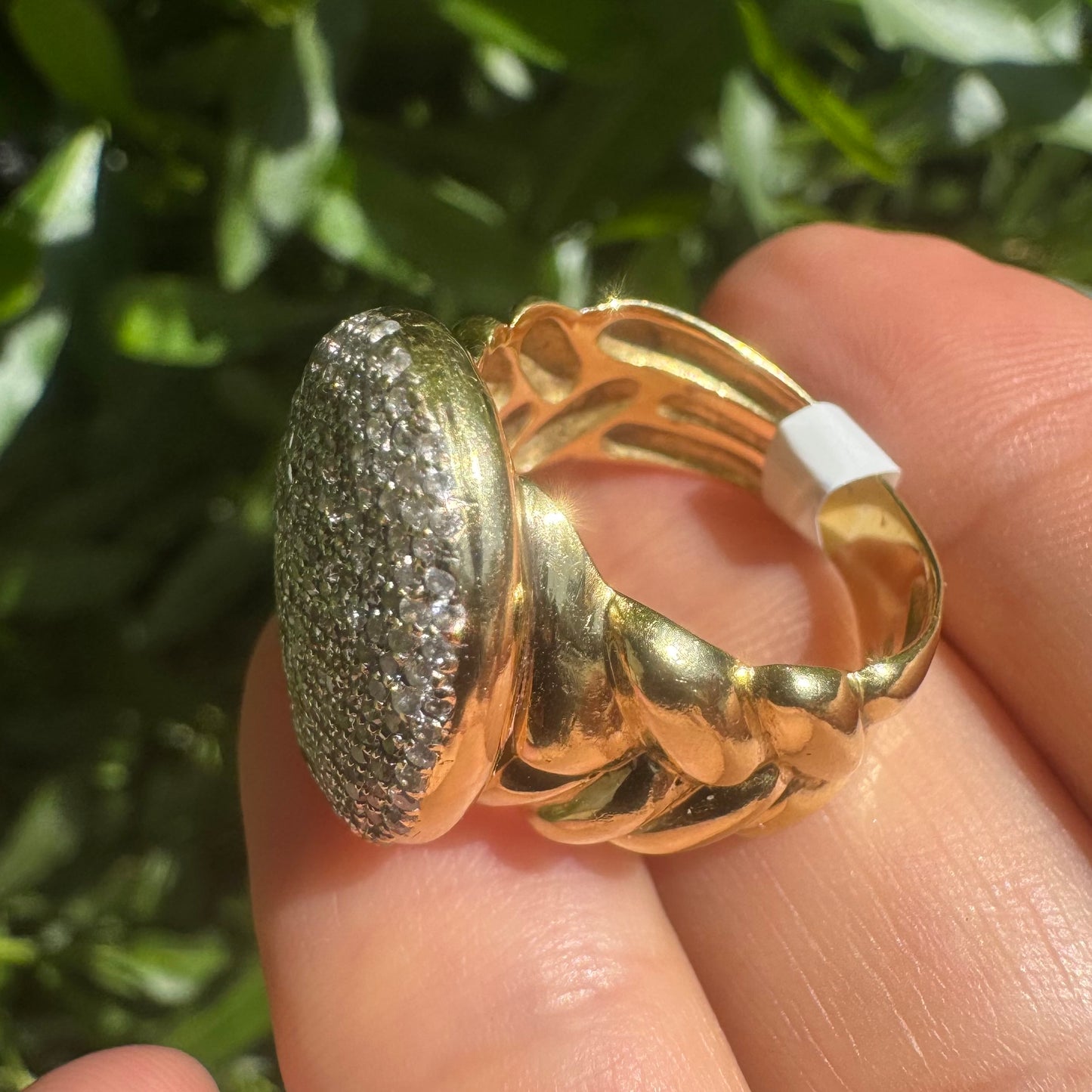 18K gold ring set with a dazzling dome of pavé-set diamonds