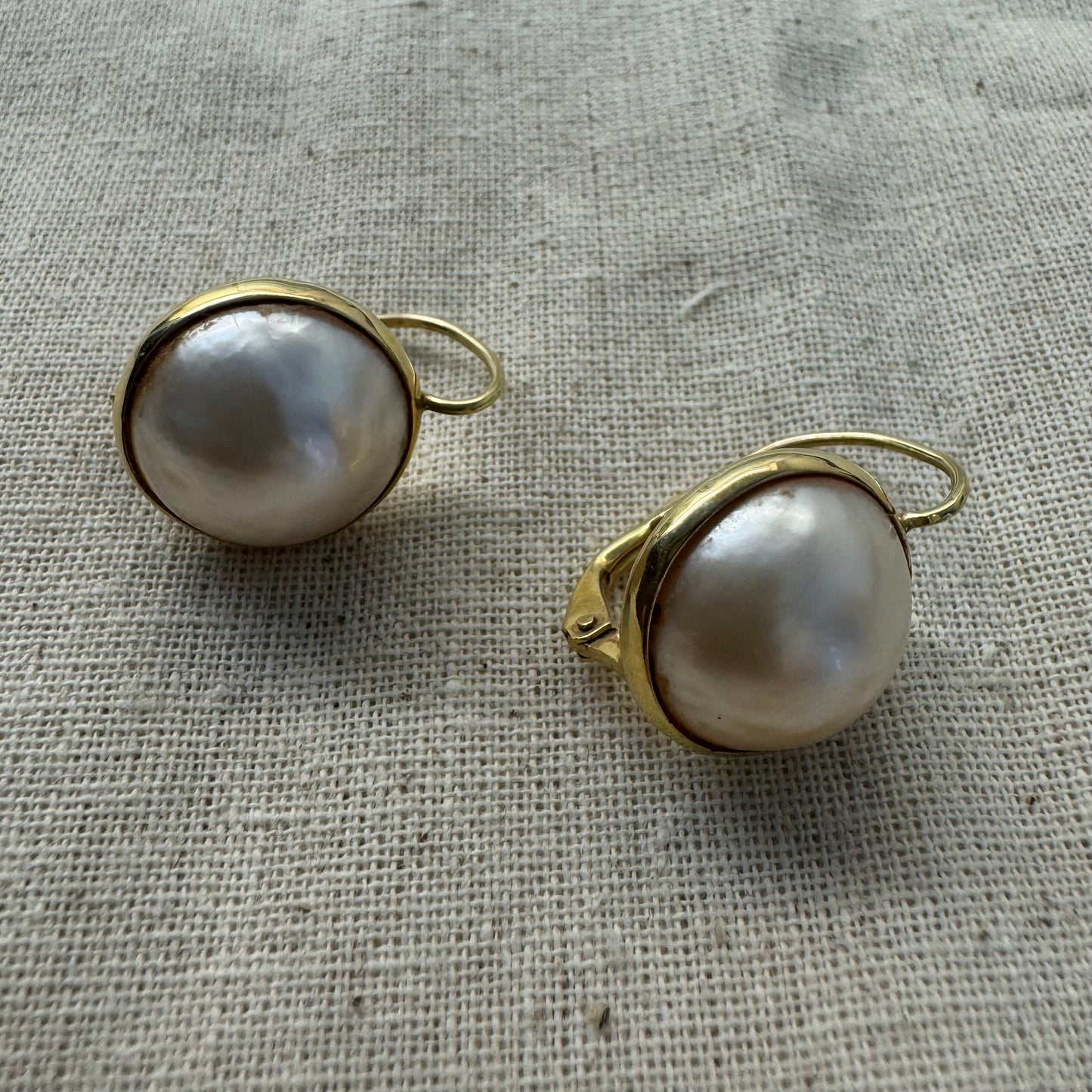 14K gold drop earrings set with flat coin pearls