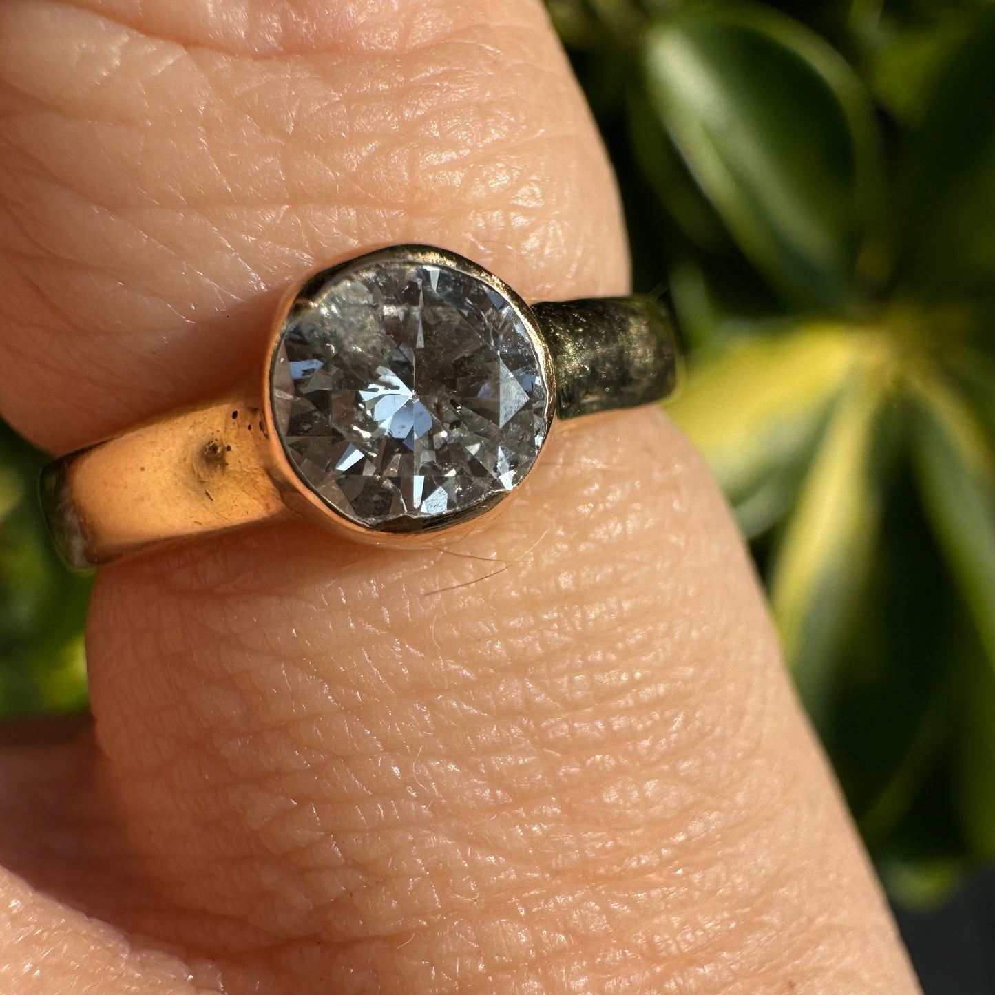 14K gold ring set with one center Diamond