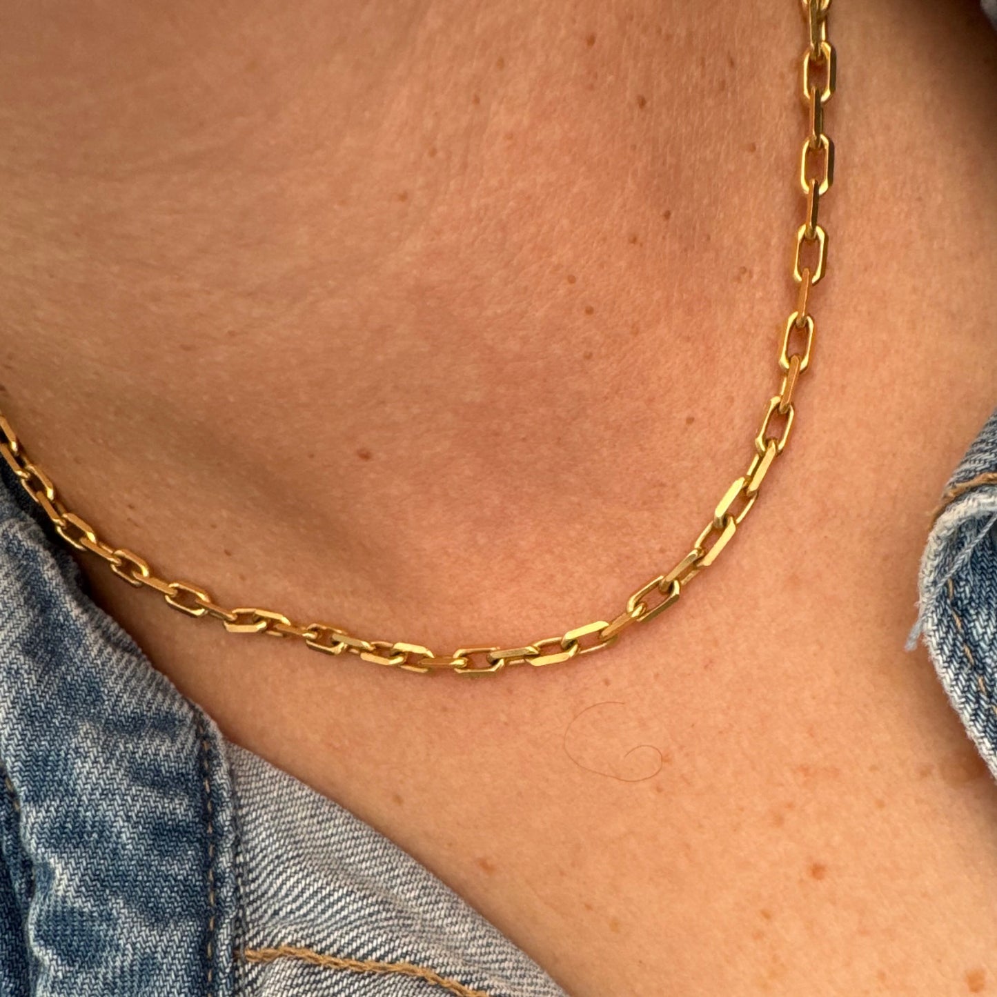 14K gold chain necklace featuring elegant elongated links with a polished finish.