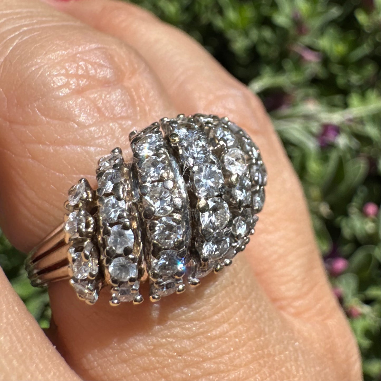 18K gold ring set with rows of sparkling Diamonds in a bold, sculptural design