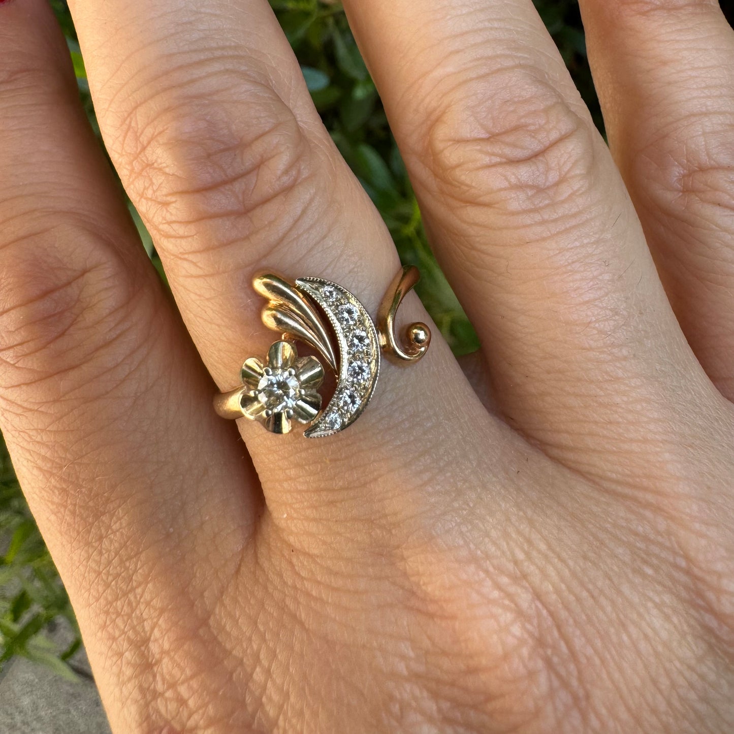 14K gold ring with a delicate moon and star motif set with Diamonds