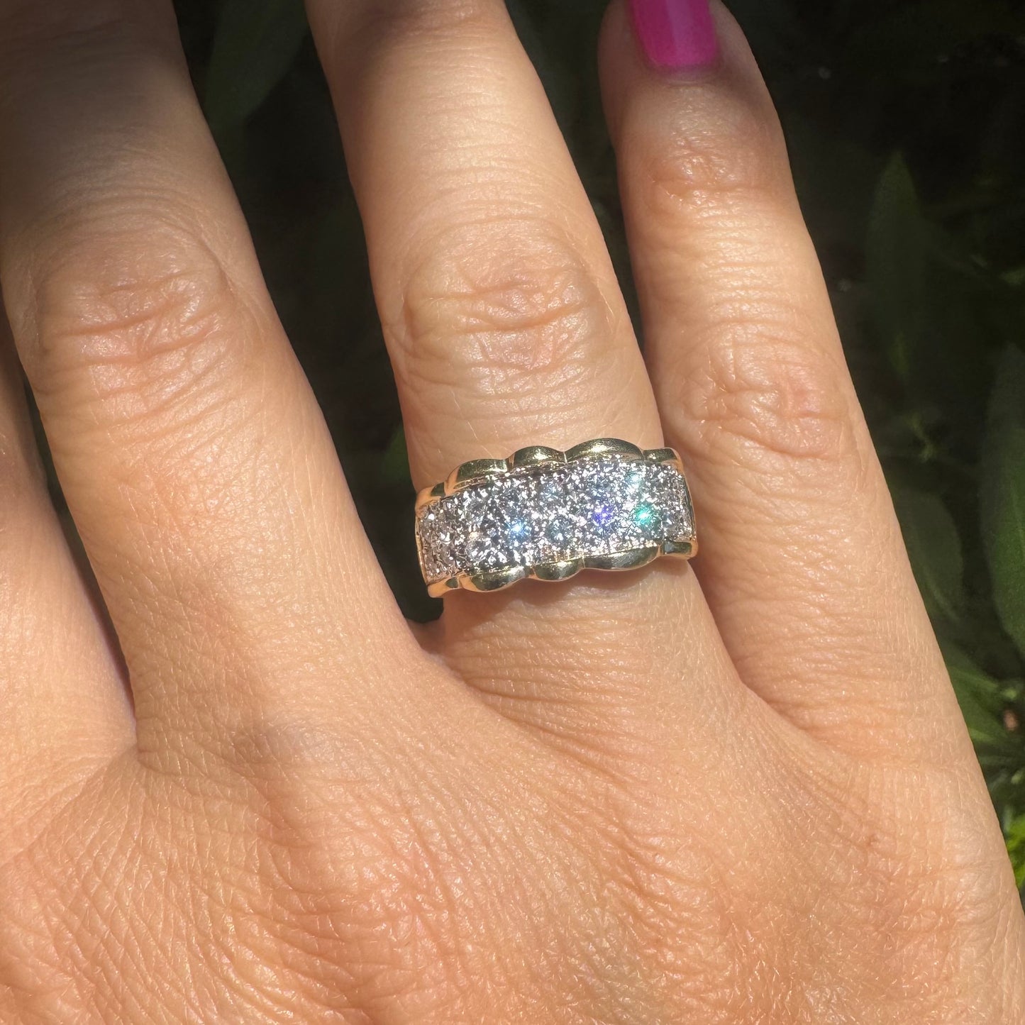 14K gold ring set with center pavé of sparkling Diamonds framed with softly waved gold edges