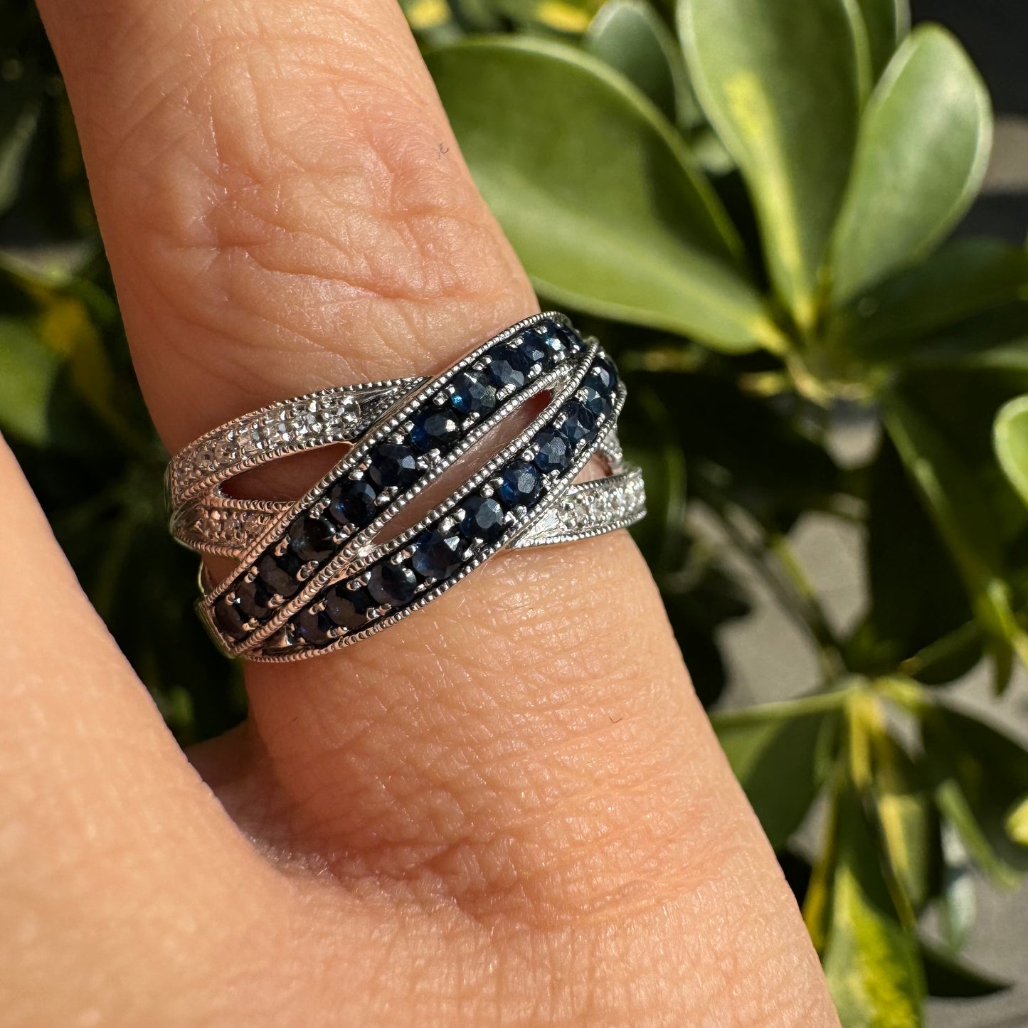 14K gold crossover ring set with Sapphires and sparkling Diamonds