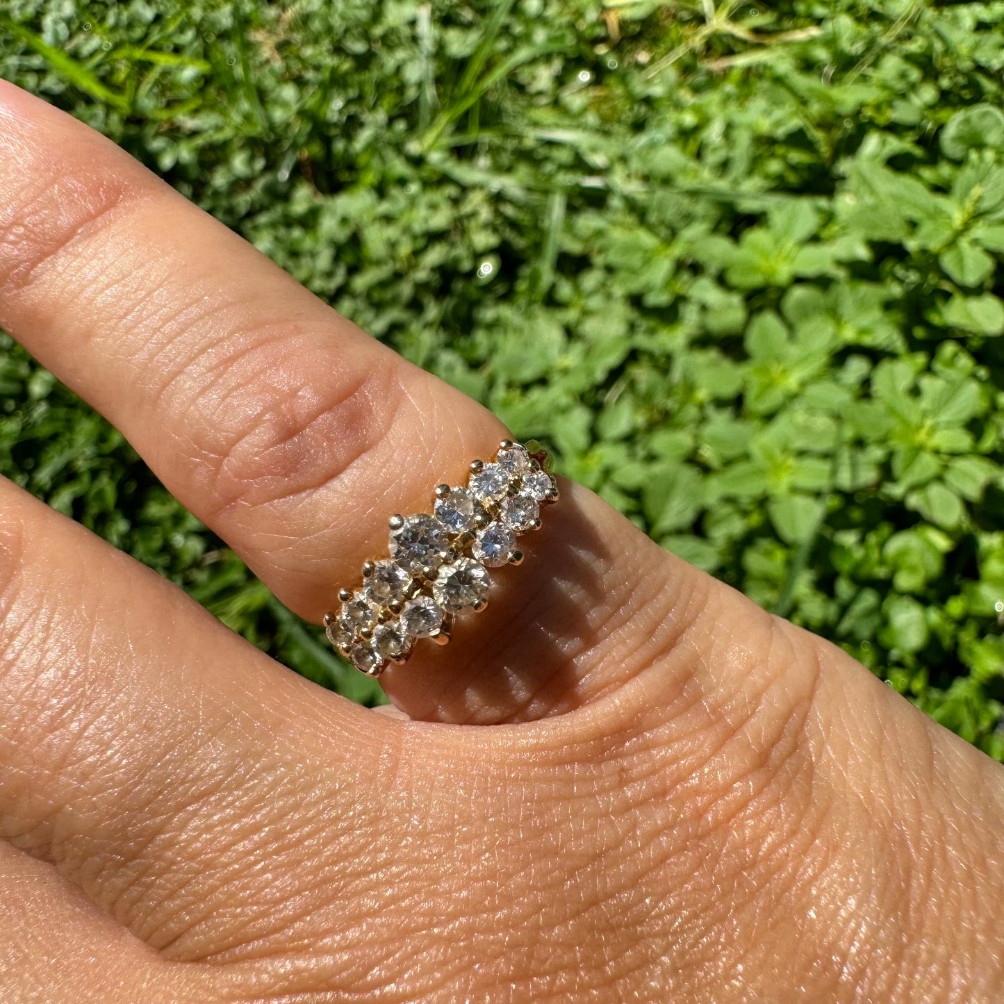 14K gold ring set with two dazzling rows of round-cut Diamonds