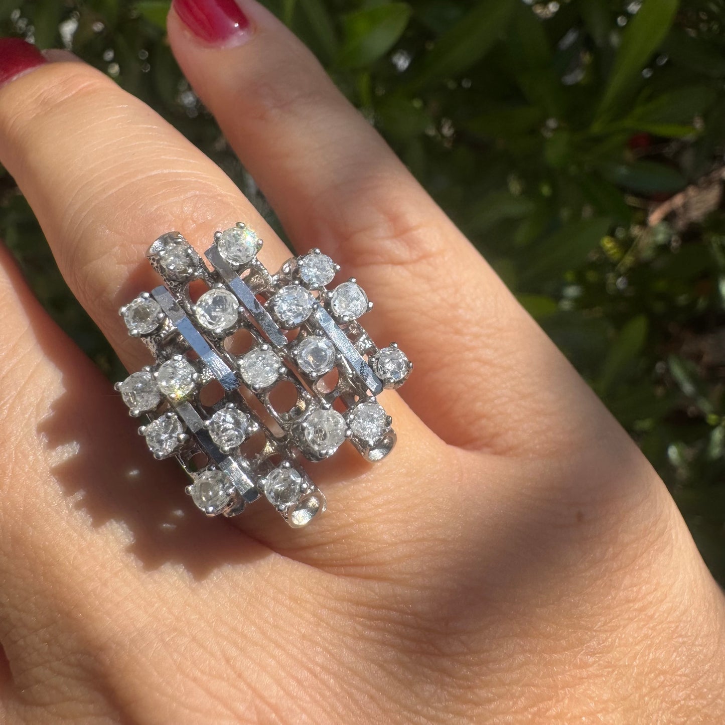 14K gold ring with a geometric design, set with multiple round Diamonds that create a sparkling, structured look.