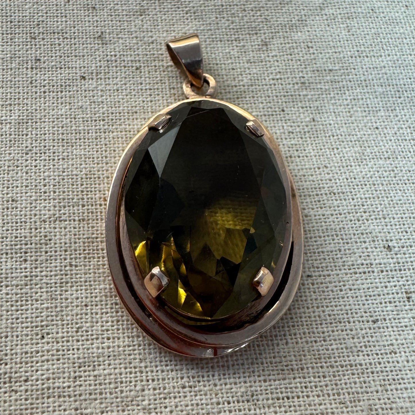 14K gold pendant set with a large oval-cut Smoky Quartz in a rare olive-green hue