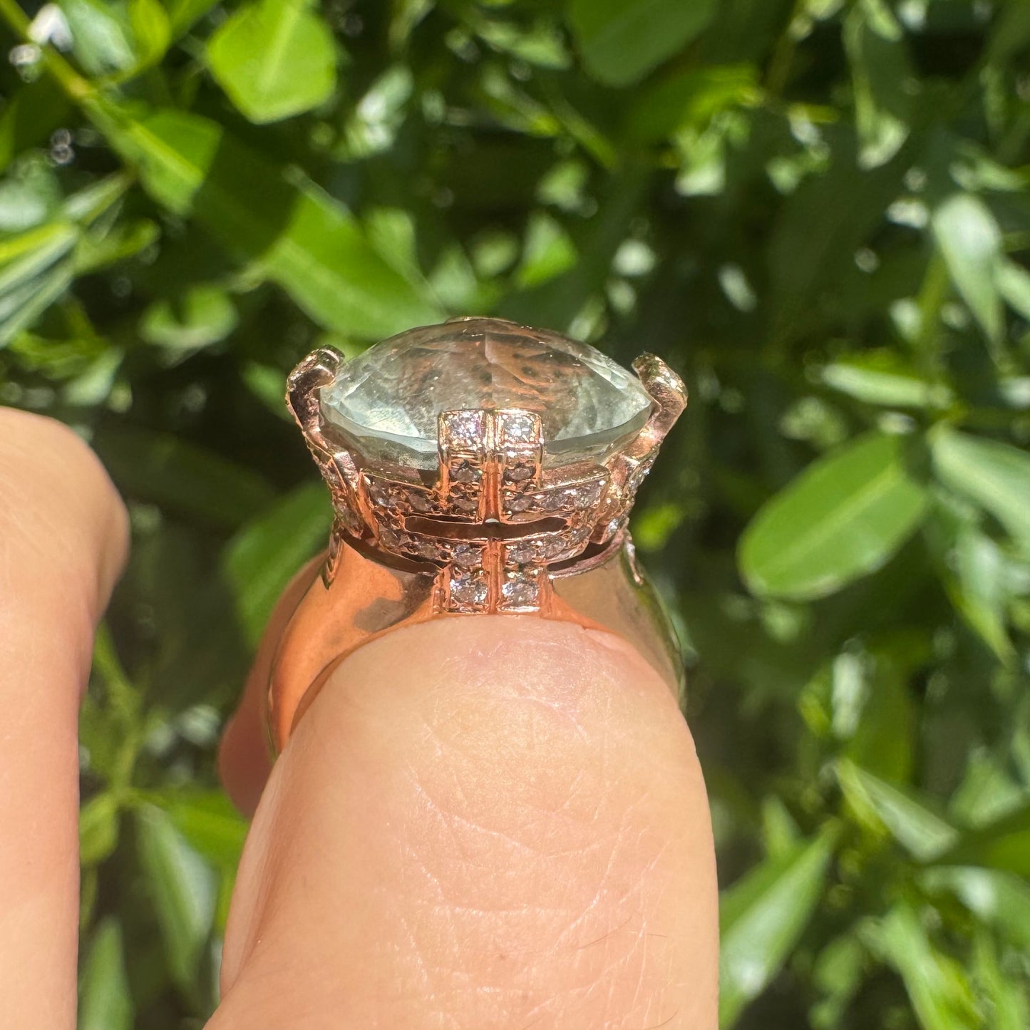 18K gold ring set with a stunning faceted Prasiolite, delicately accented with Diamonds on each prong