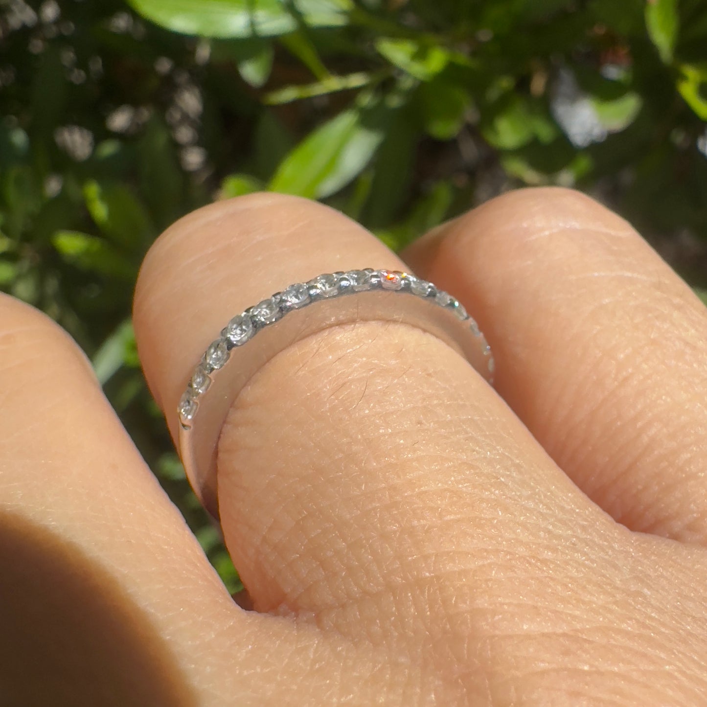 14K gold half-eternity ring set with a row of sparkling round Diamonds.