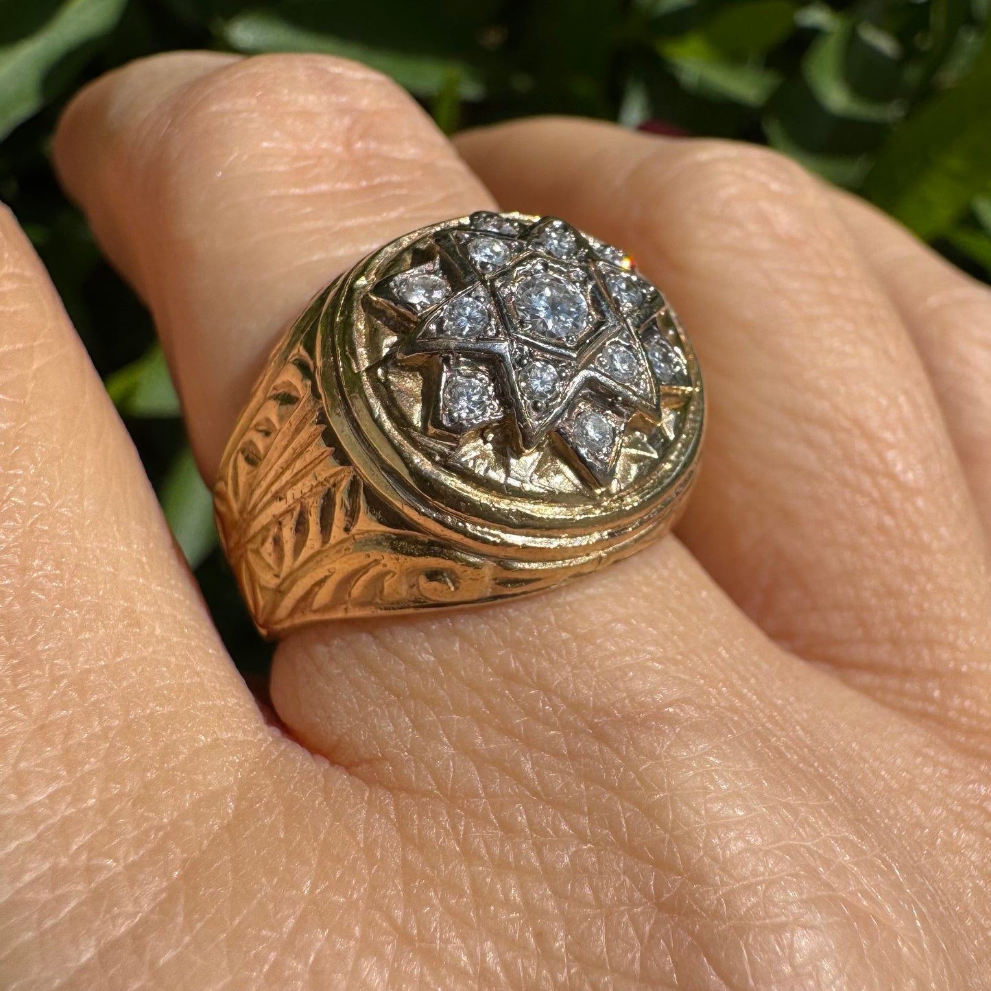 18K gold ring set with a dazzling double Star of David motif, meticulously set with shimmering Diamonds