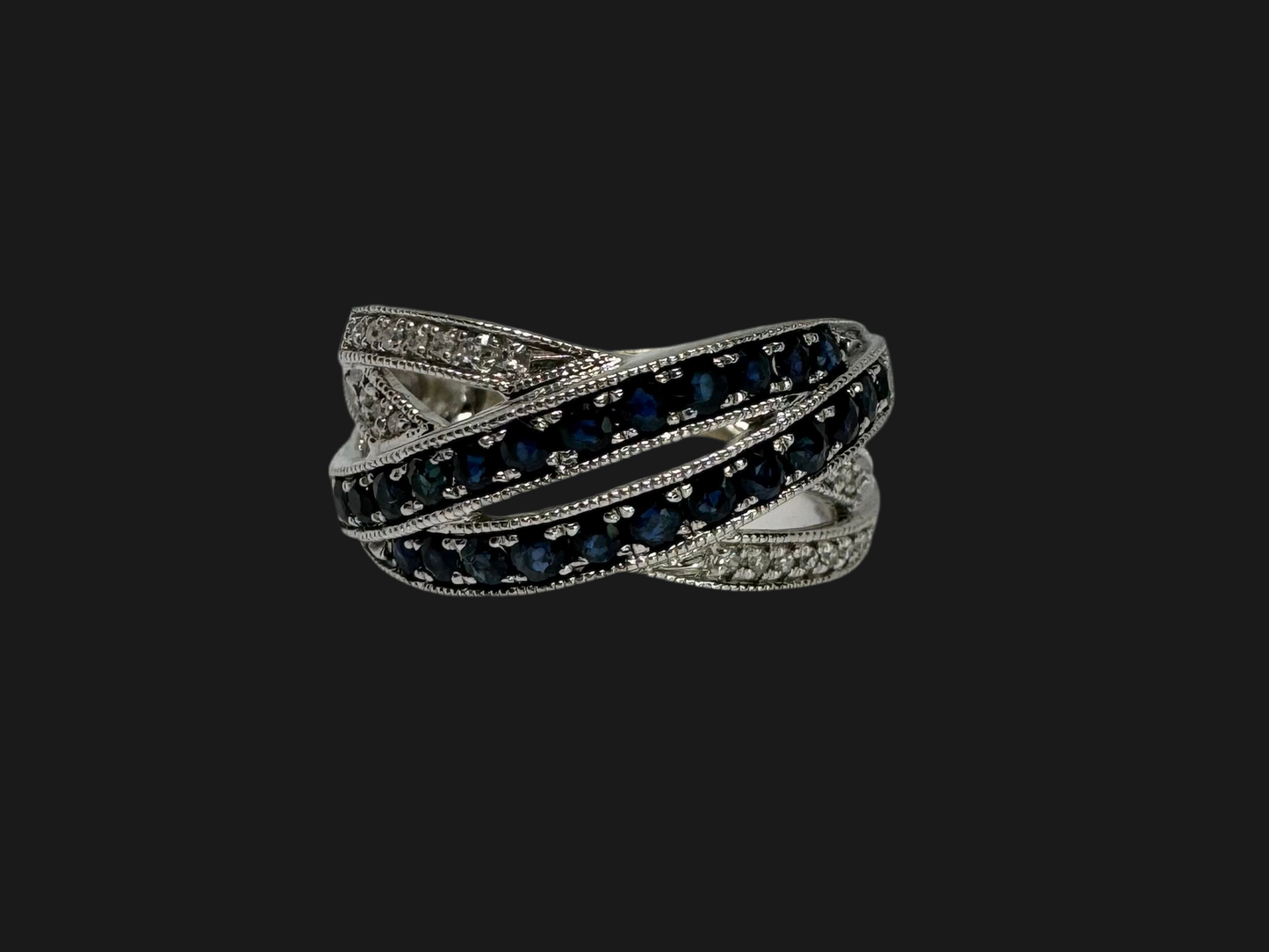 14K gold crossover ring set with Sapphires and sparkling Diamonds