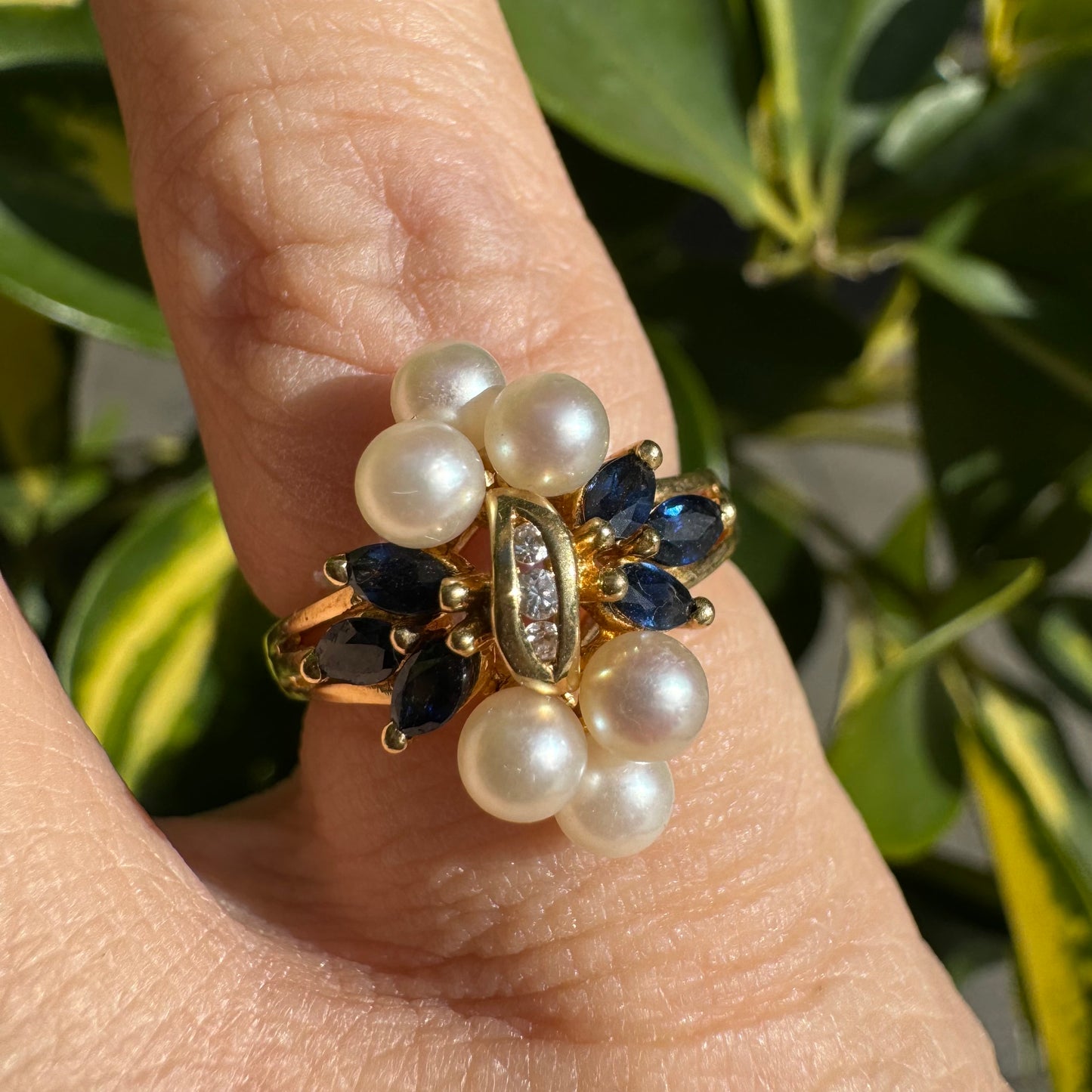18K gold floral-inspired ring set with Diamonds, Sapphire & Pearls