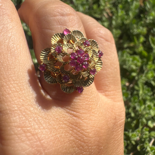 18K gold ring crafted in yellow gold, designed in a layered floral motif set with Rubies