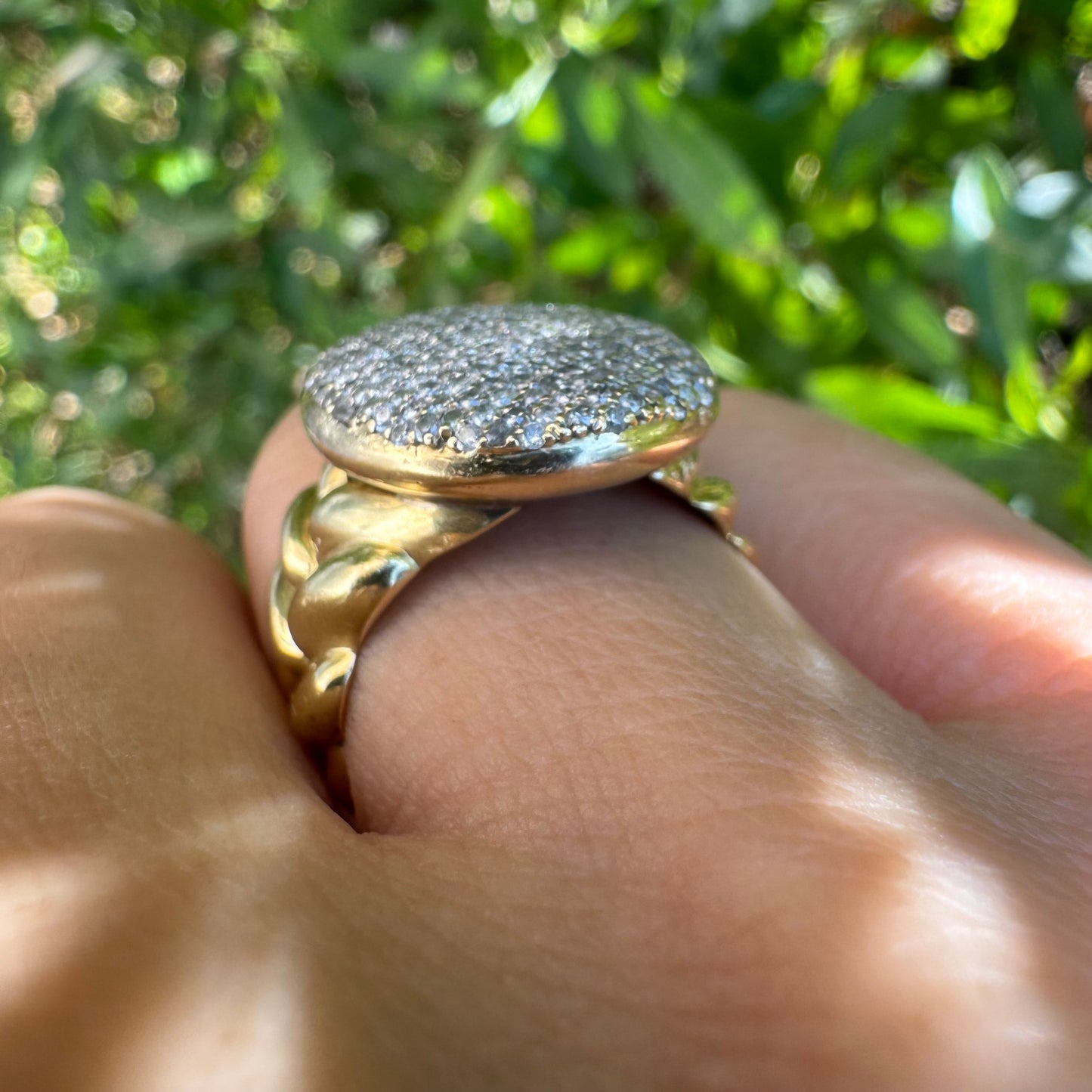 18K gold ring set with a dazzling dome of pavé-set diamonds